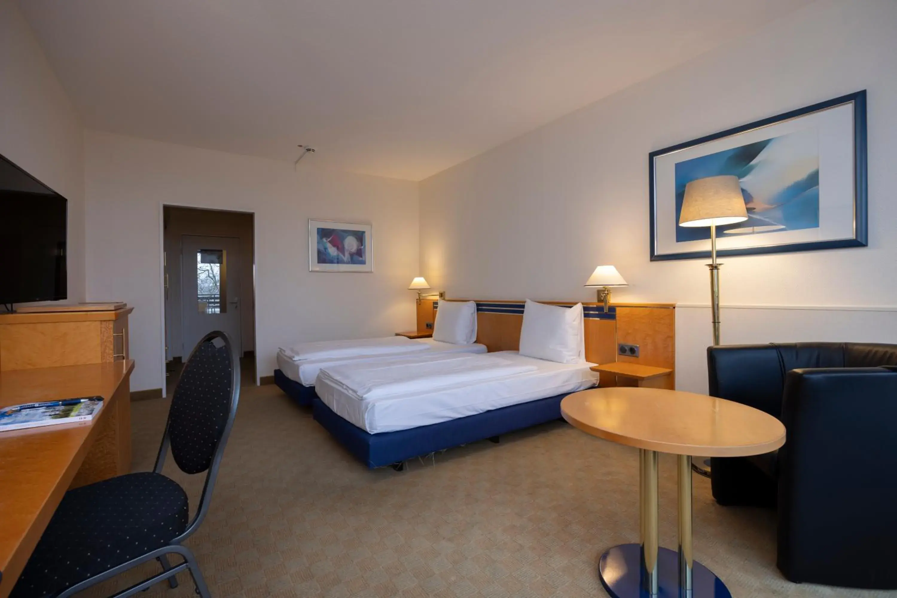 Photo of the whole room, Bed in Fletcher Hotel-Restaurant Arnsberg-Sauerland Photo of the whole room, Bed in Fletcher Hotel-Restaurant Arnsberg-Sauerland