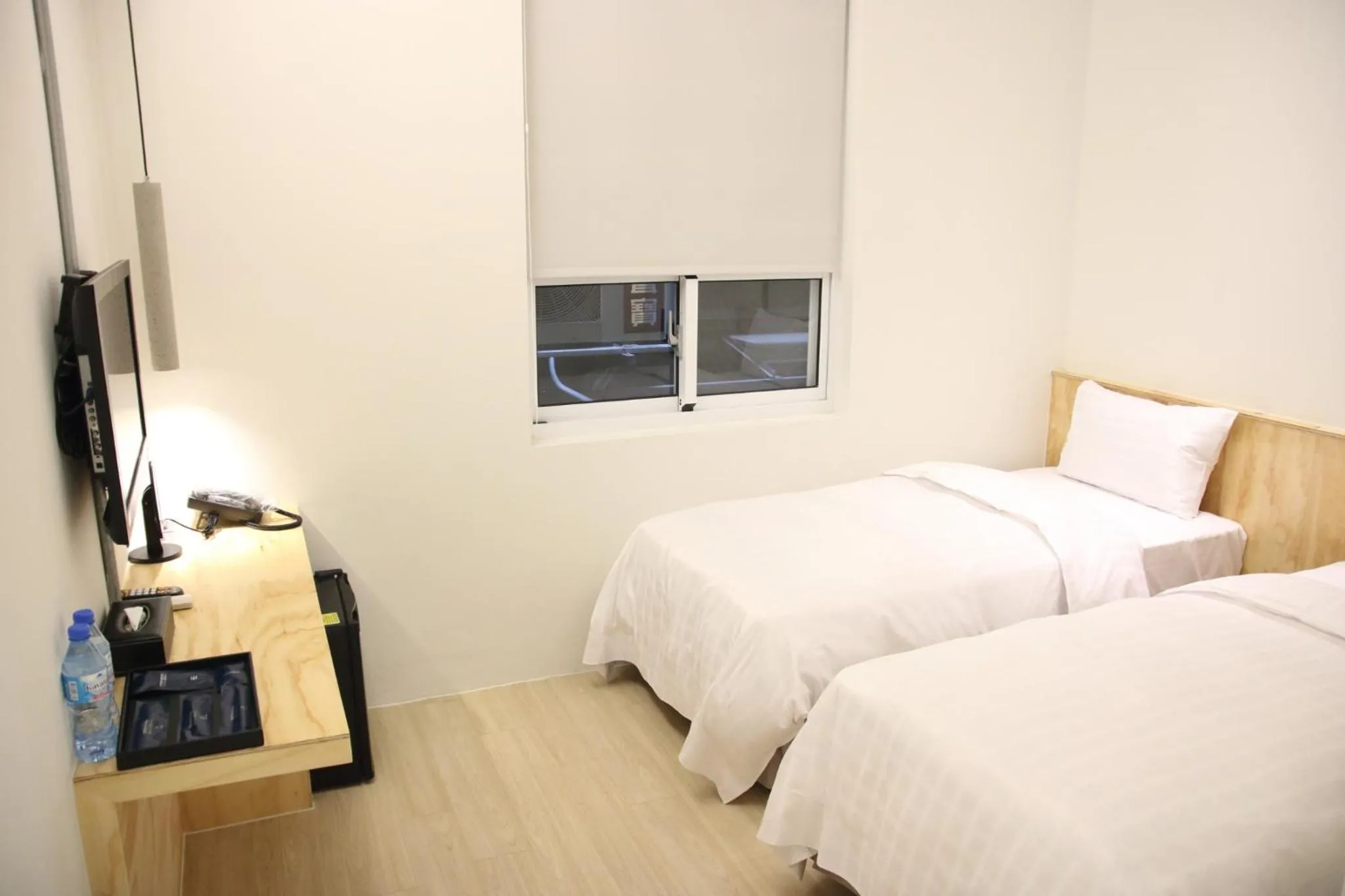 Bed in Home Rest Hotel 2