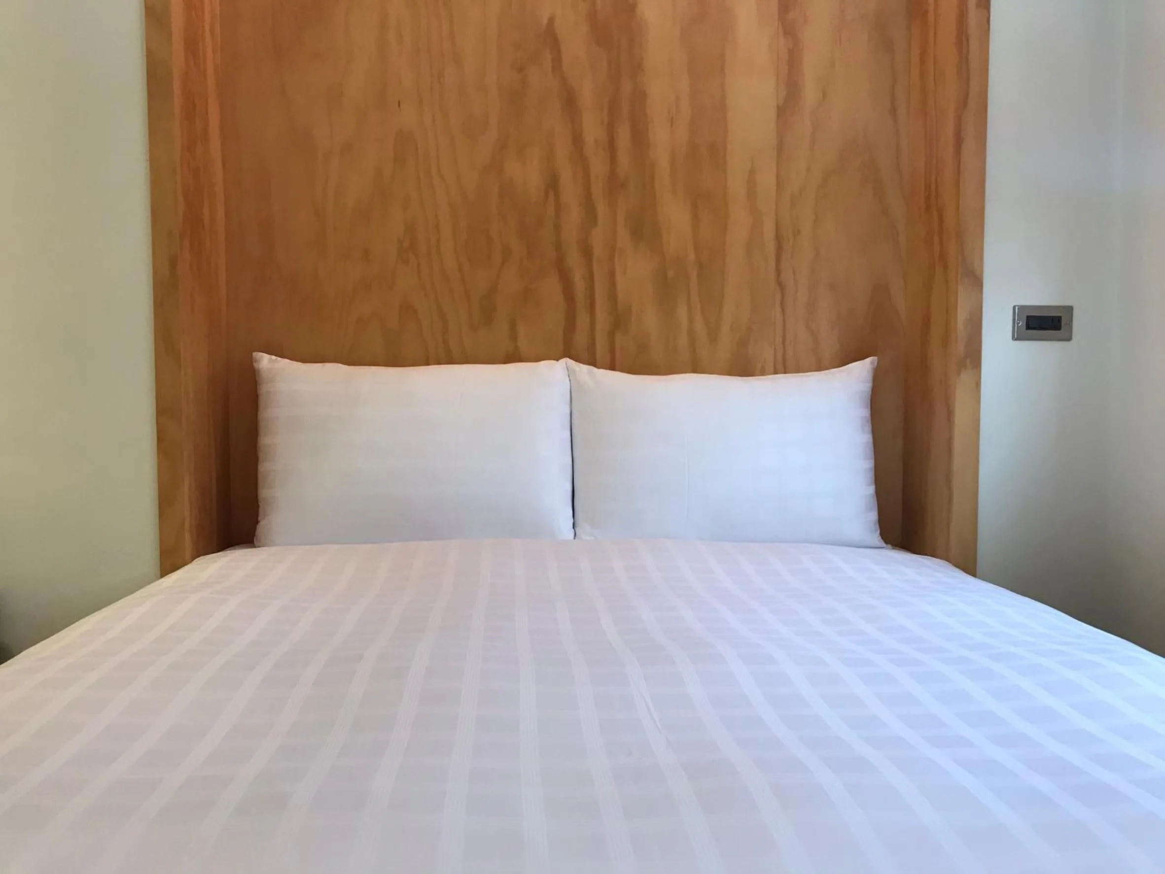 Bed in Home Rest Hotel 2