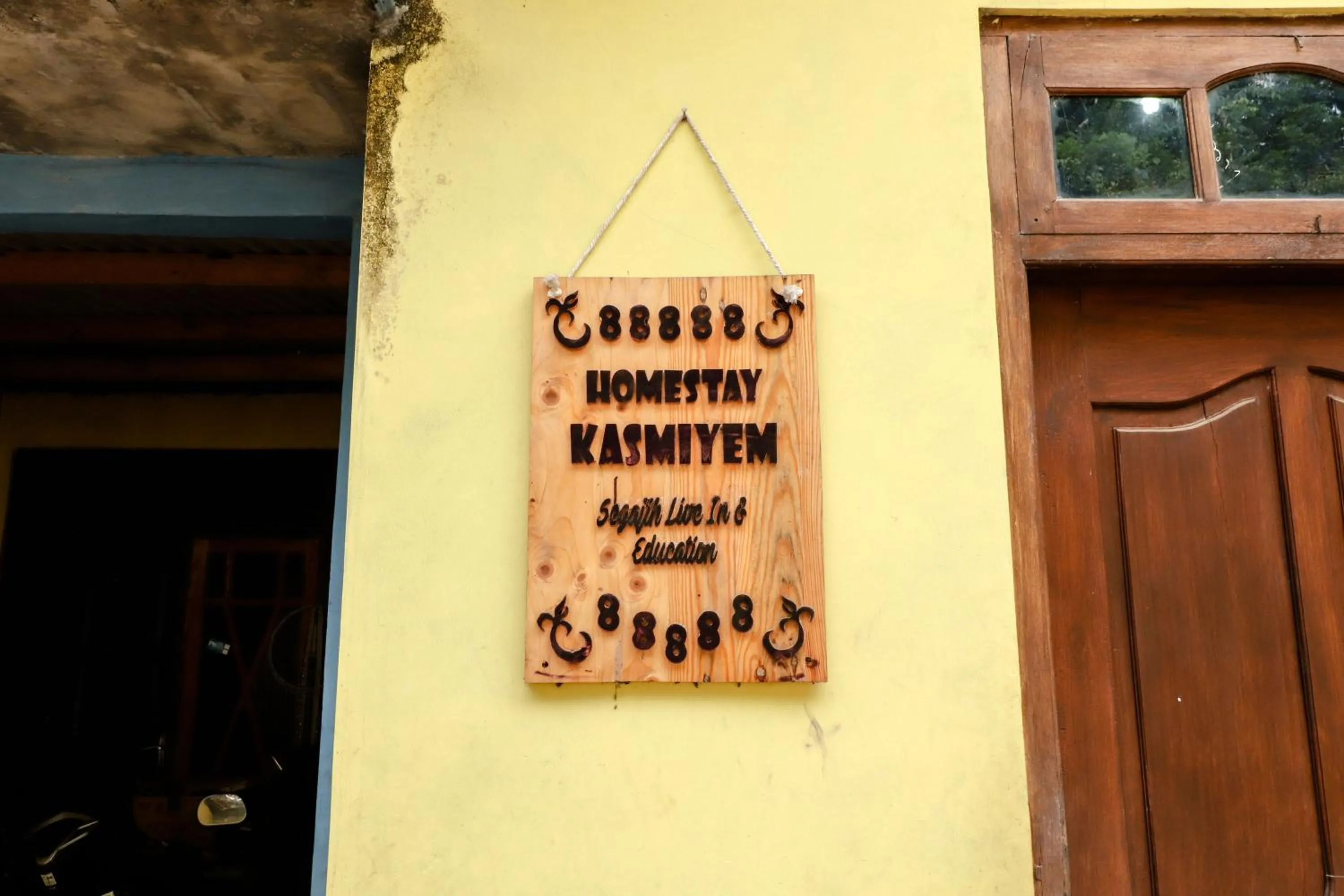 Property logo or sign in Kasmiyem Homestay