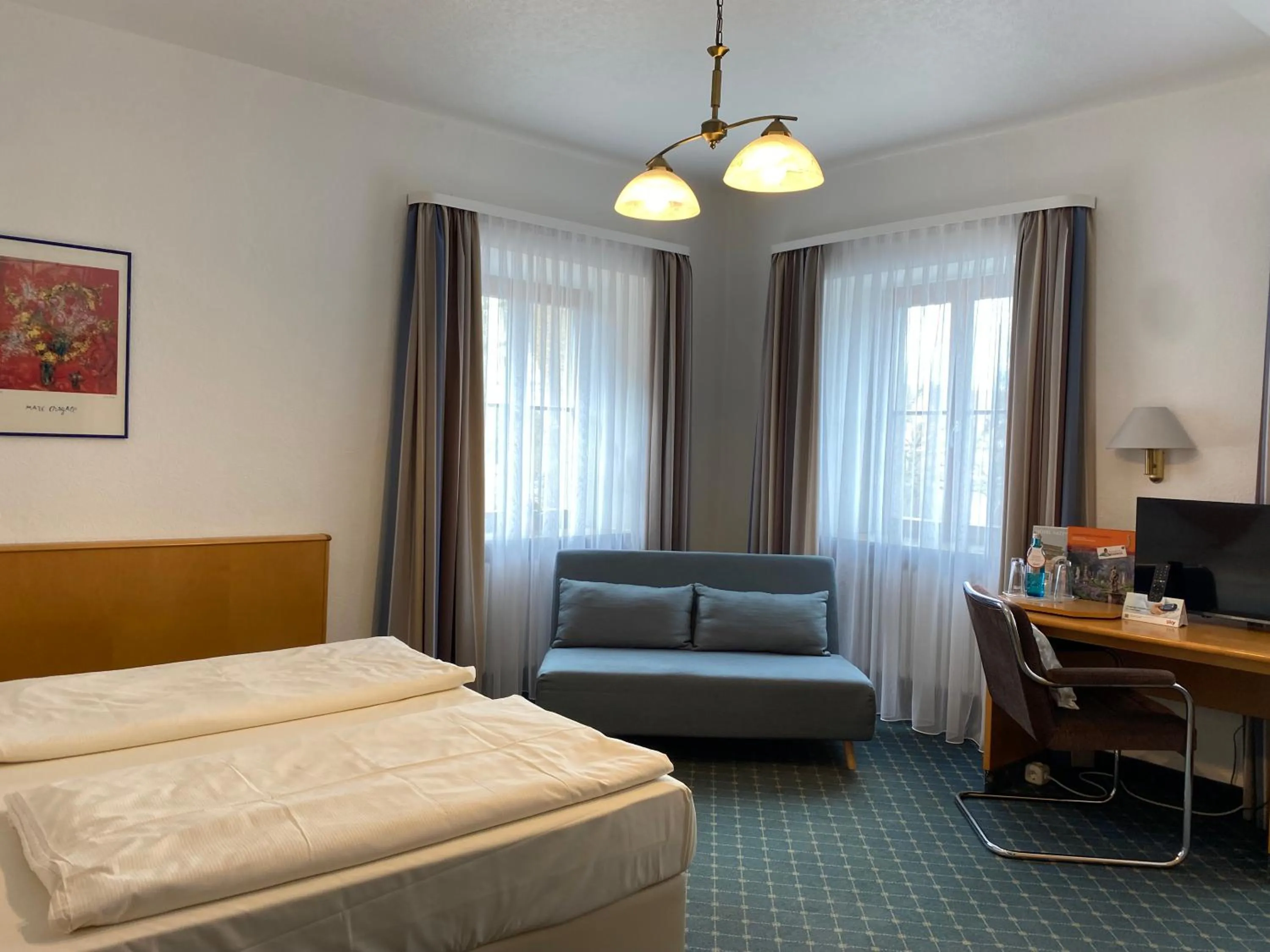 Photo of the whole room, Bed in Akzent Hotel Schranne