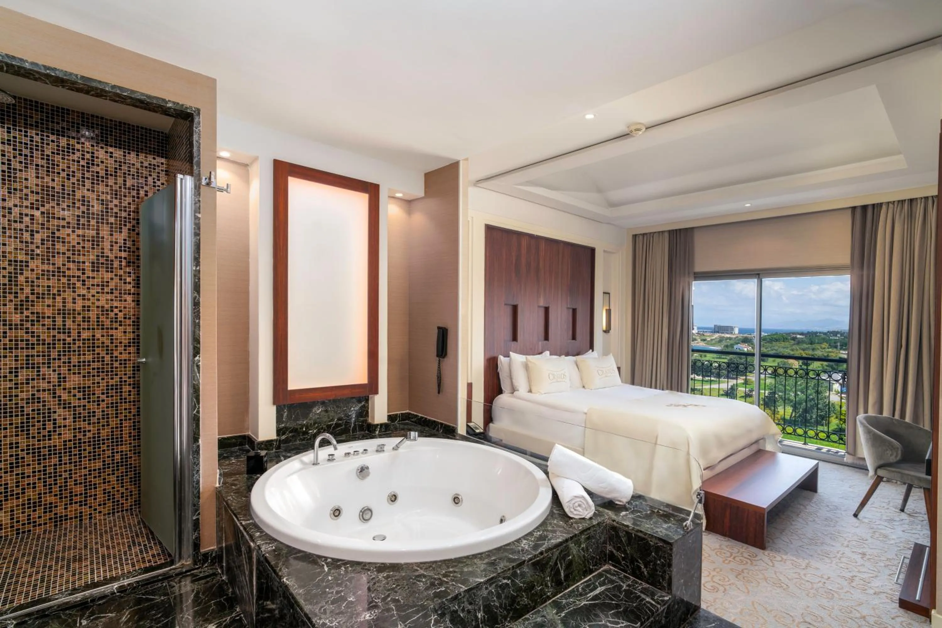 Bed in Cratos Premium Hotel Casino & SPA