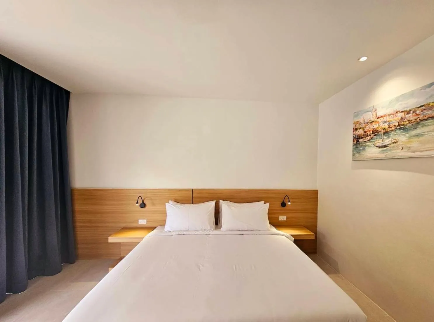 Bed in ARENICE Boutique Hotel