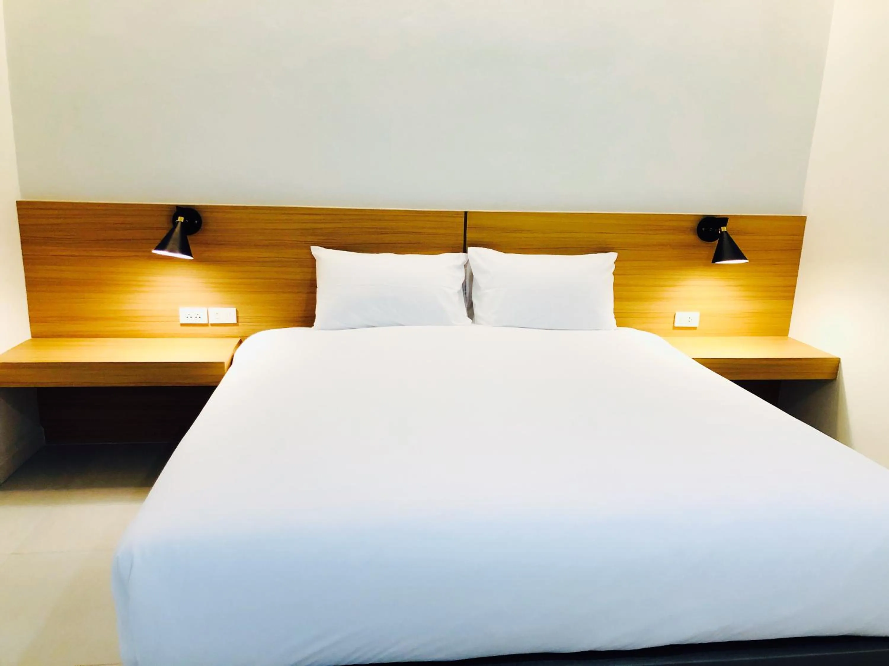 Bed in ARENICE Boutique Hotel