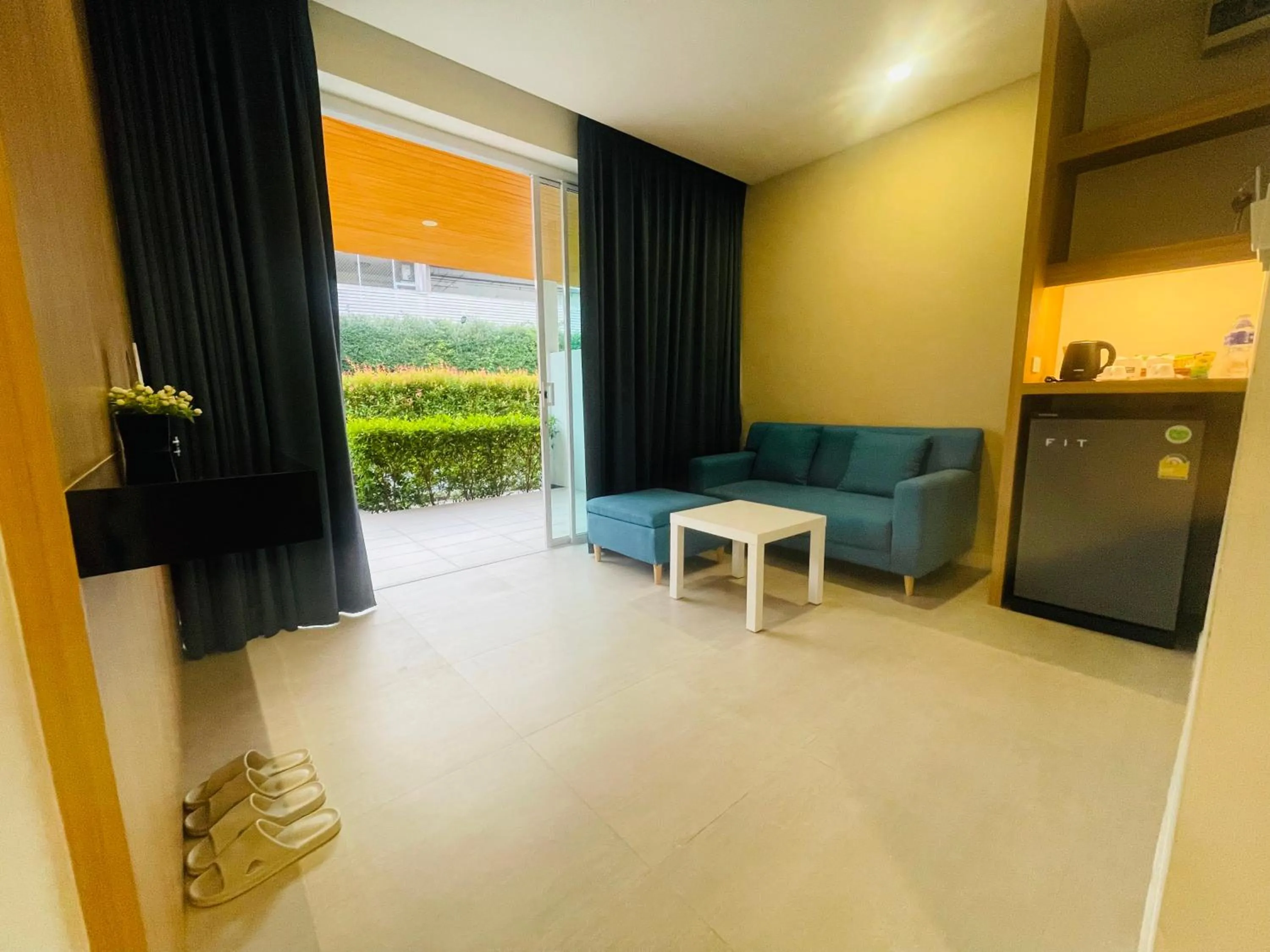 Seating area in ARENICE Boutique Hotel