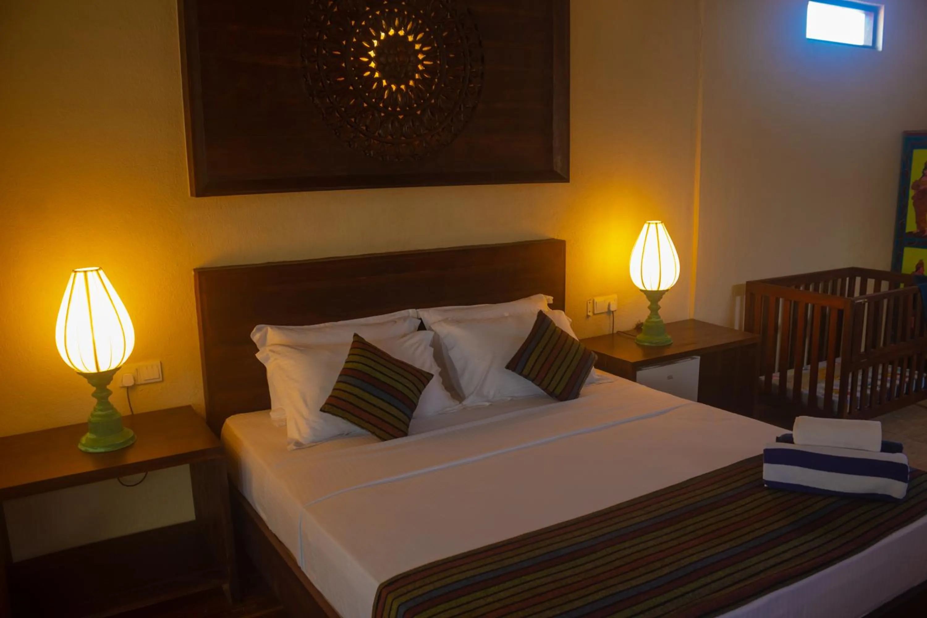 Bed in Guru Beach Resort