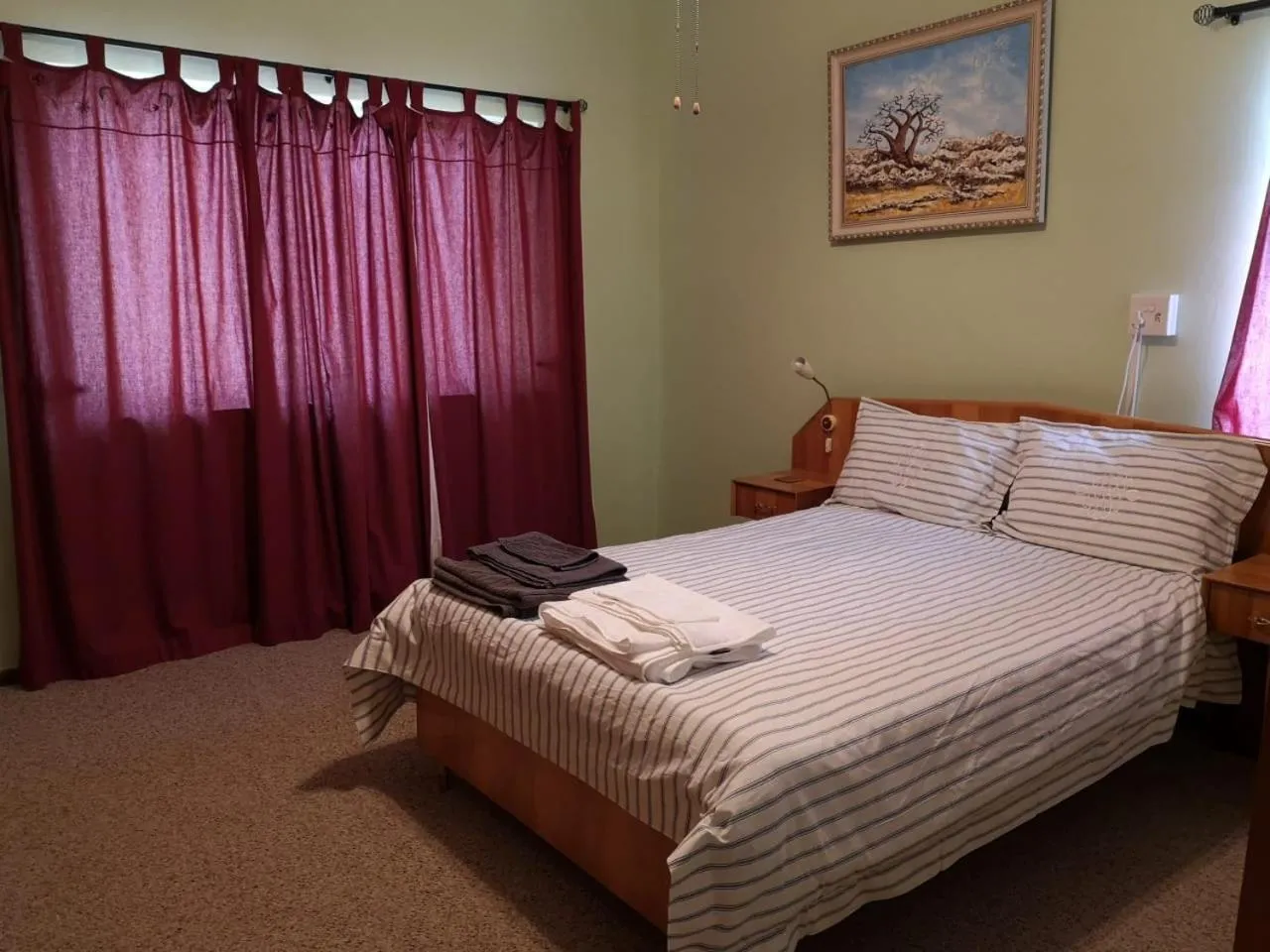 Bed in DKC Accommodation