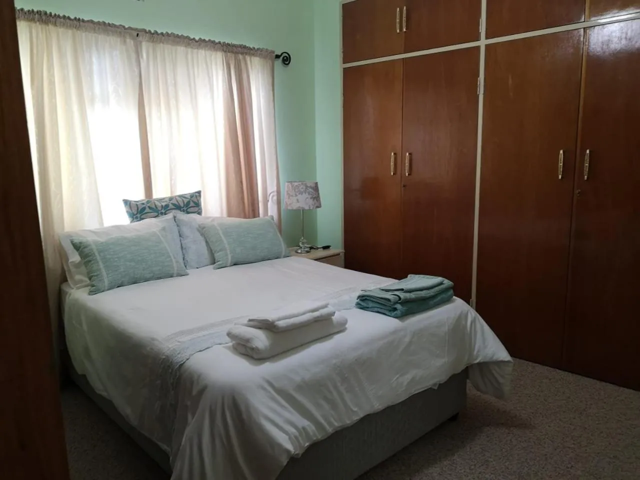Bed in DKC Accommodation