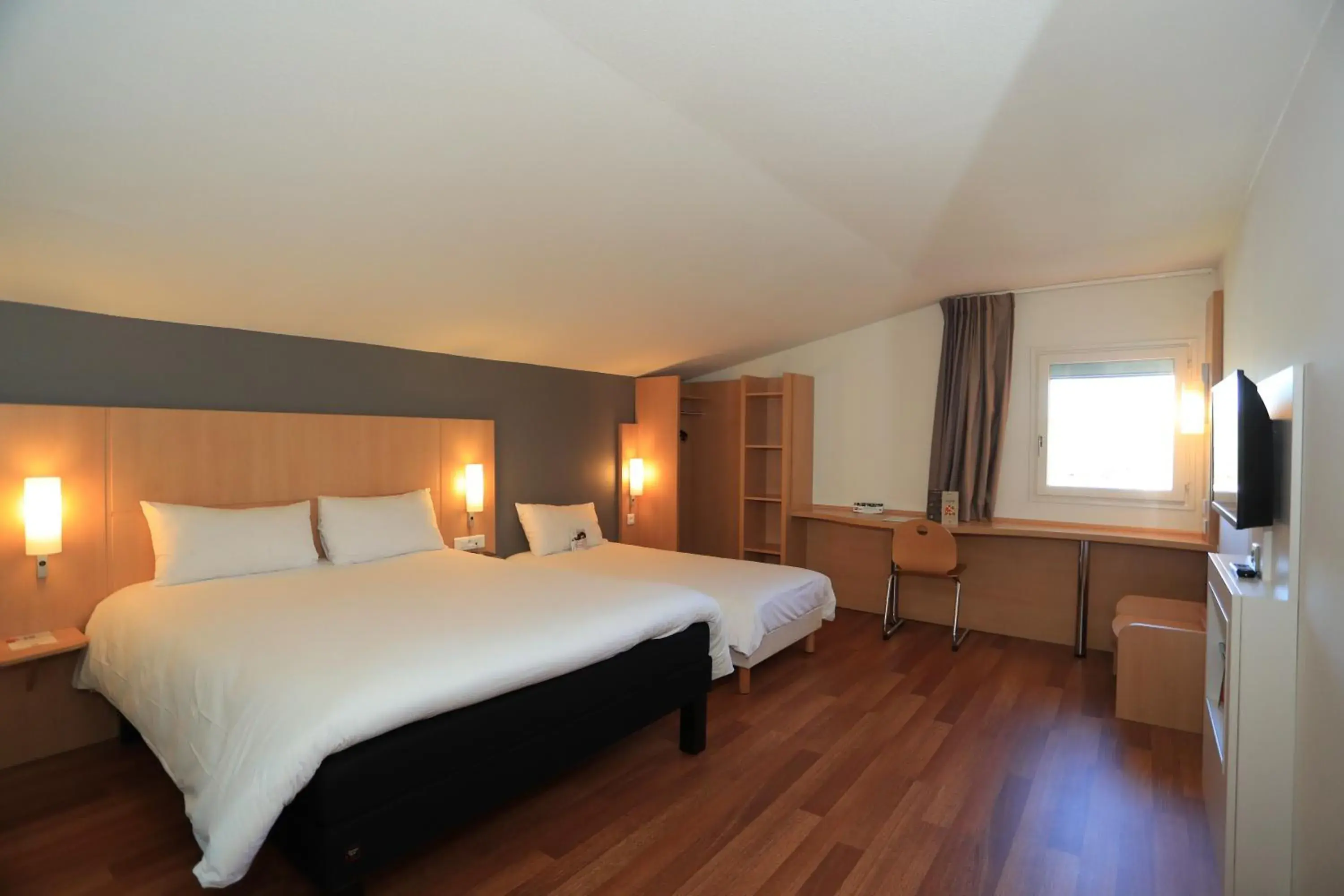 Bed in ibis Aurillac Bed in ibis Aurillac
