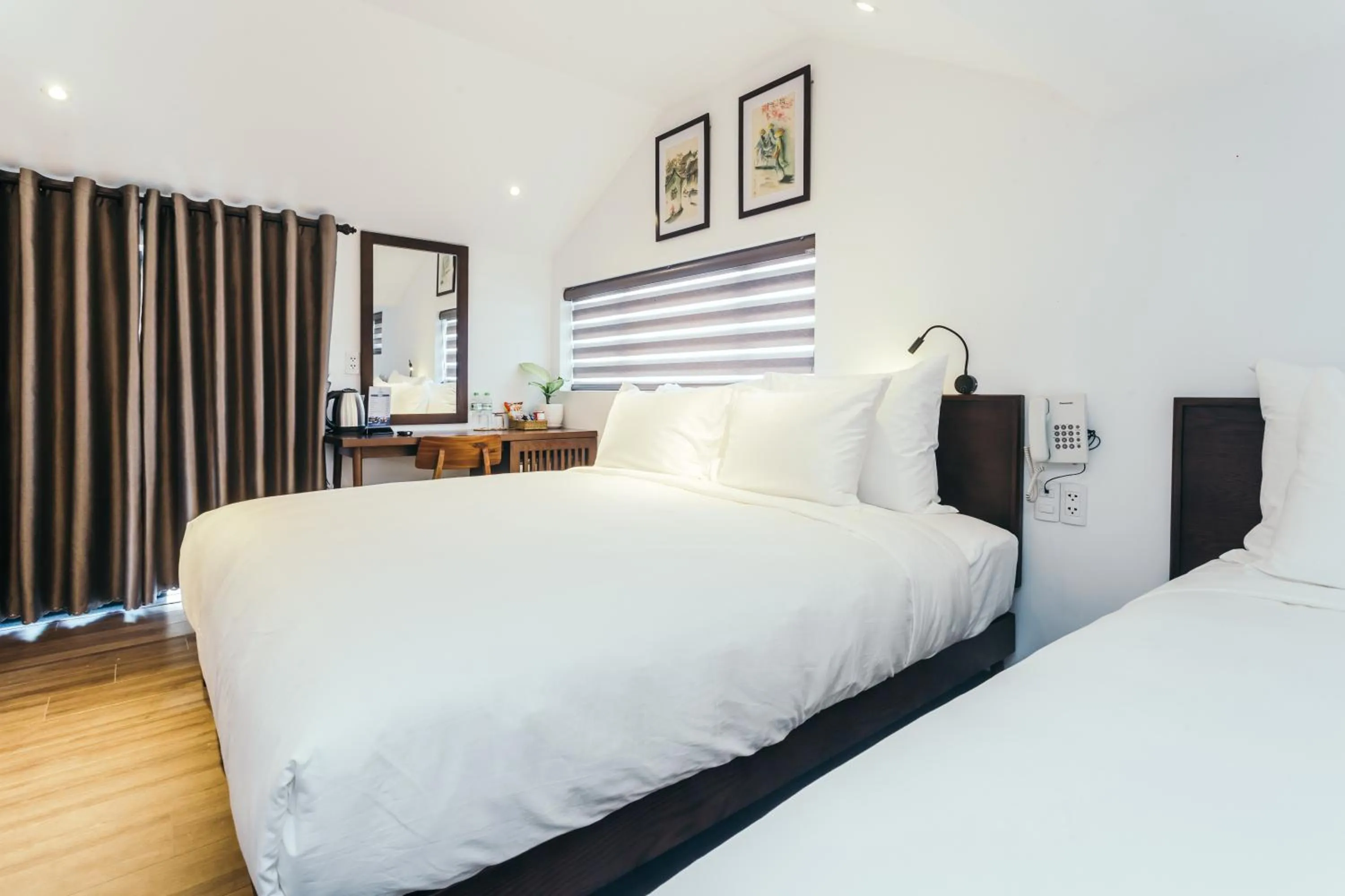 Photo of the whole room, Bed in Le Petit Villa Hoi An