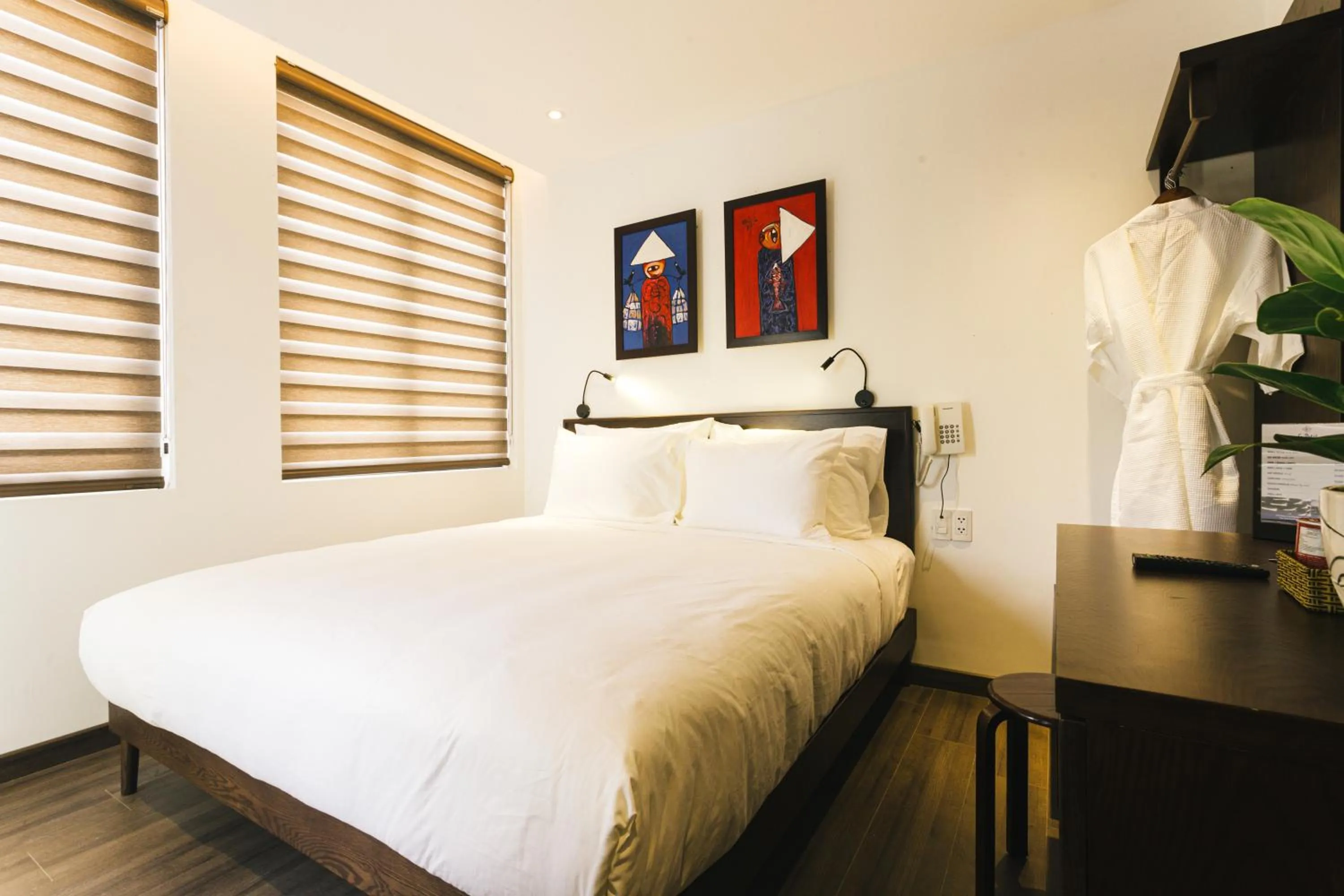 Photo of the whole room, Bed in Le Petit Villa Hoi An