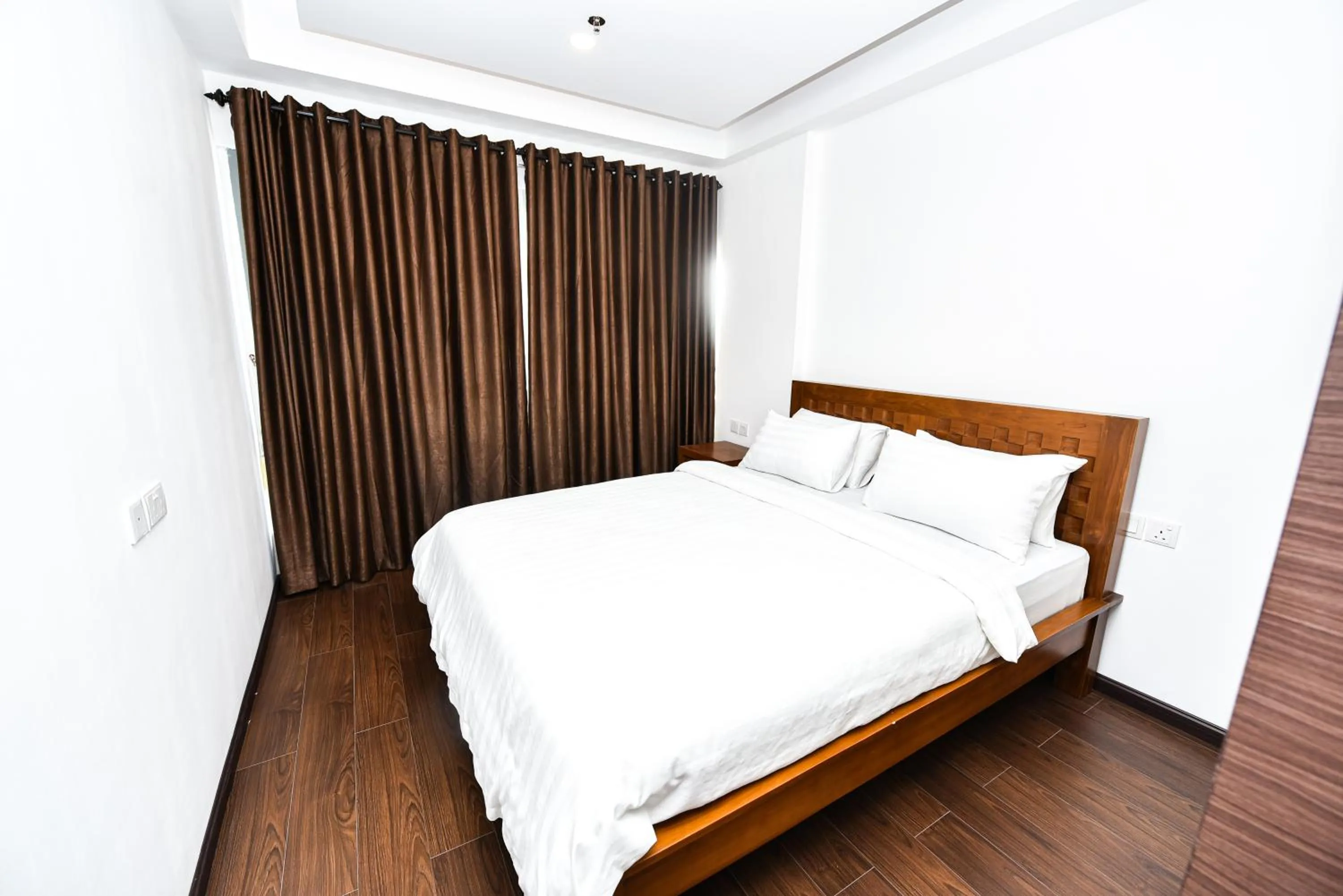 Bed in LOVINA 17-11 at Harbour Bay Residences