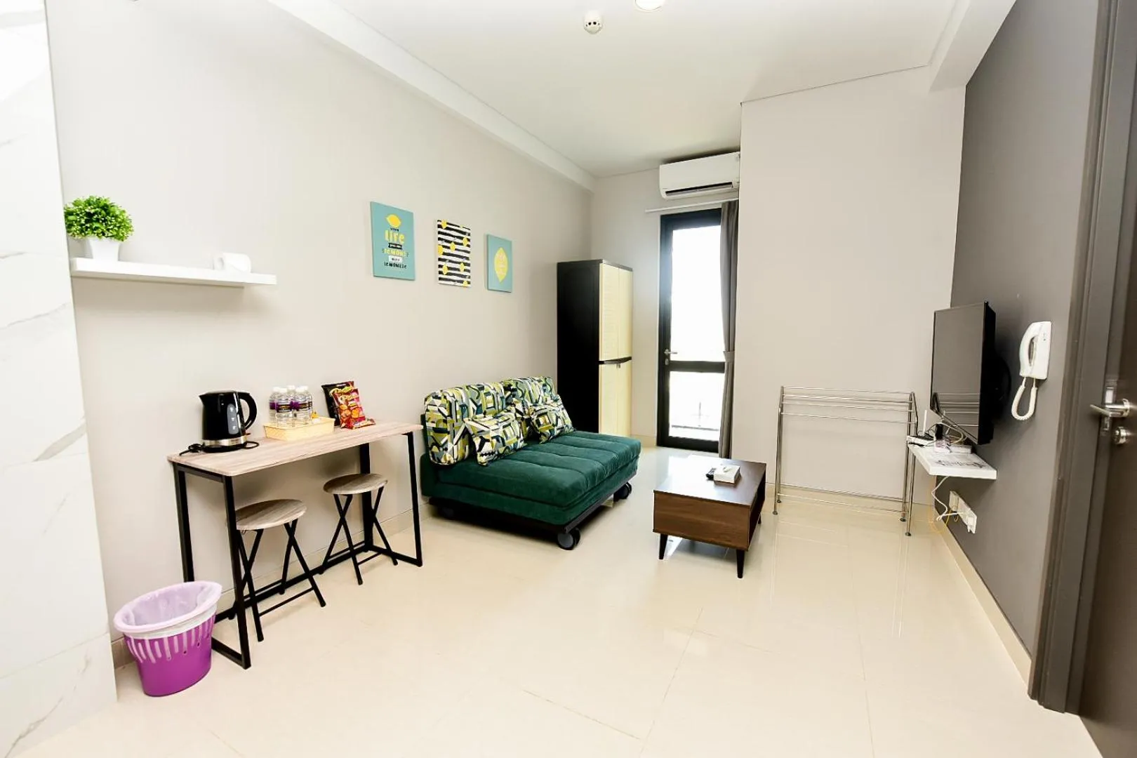 TV and multimedia in LOVINA 7-AE at One Residence (beside Harris Hotel)