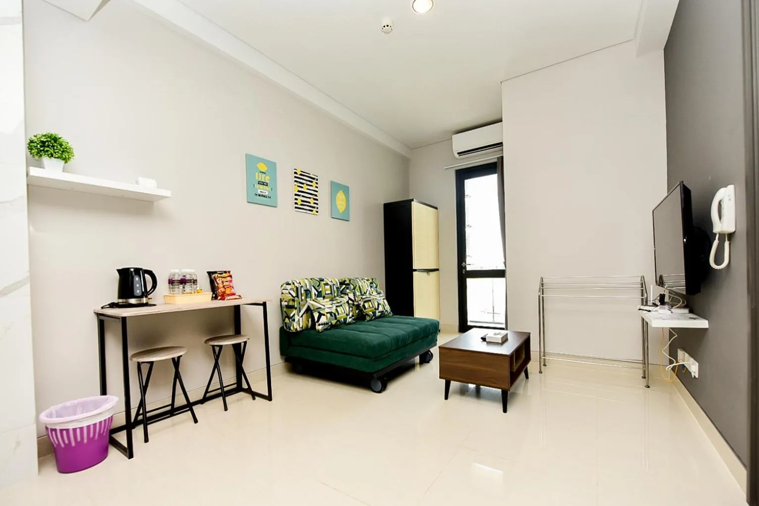 TV and multimedia in LOVINA 7-AE at One Residence (beside Harris Hotel)