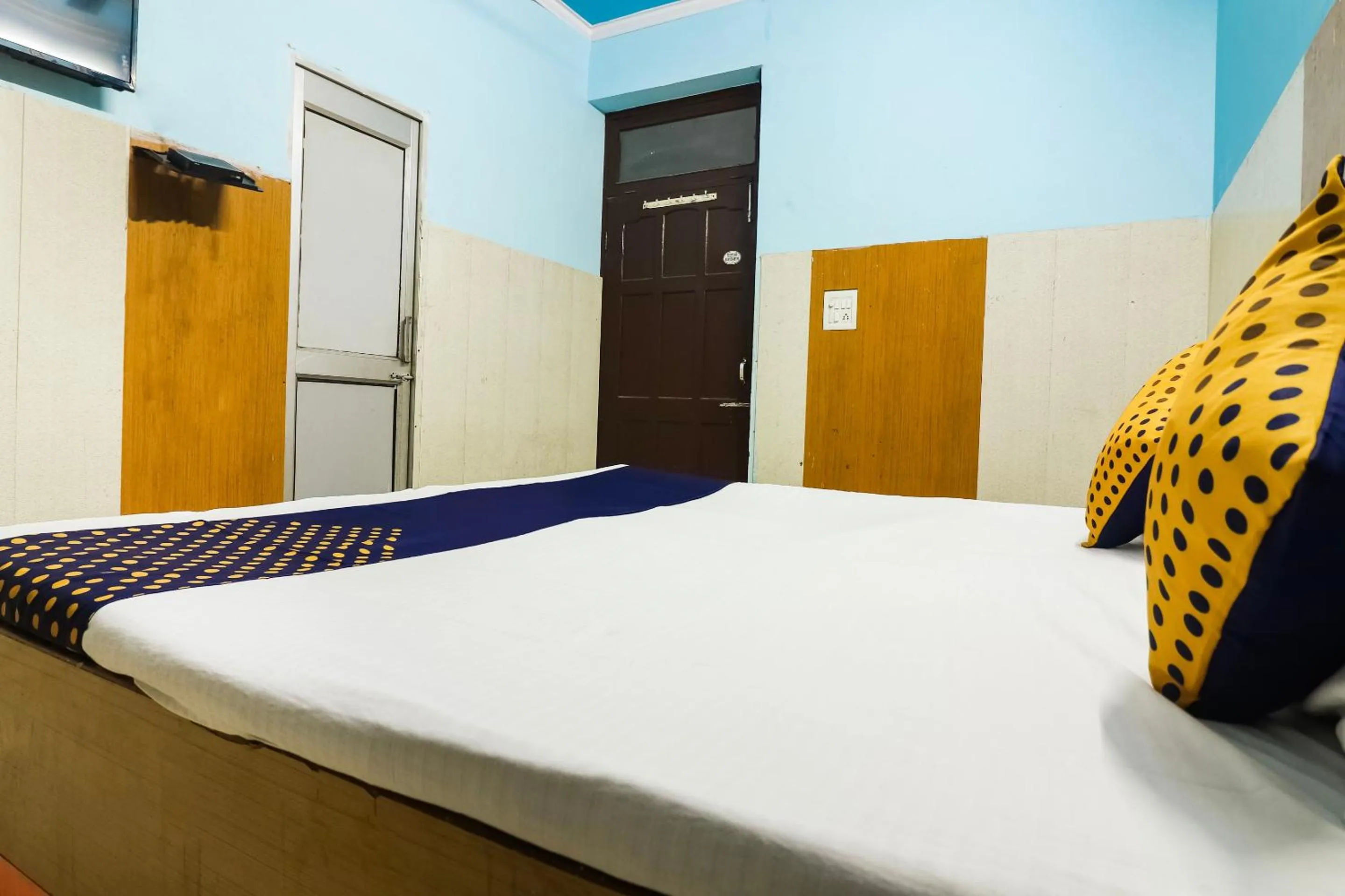 Bedroom in SPOT ON 67868 Hotel Gourav Regency