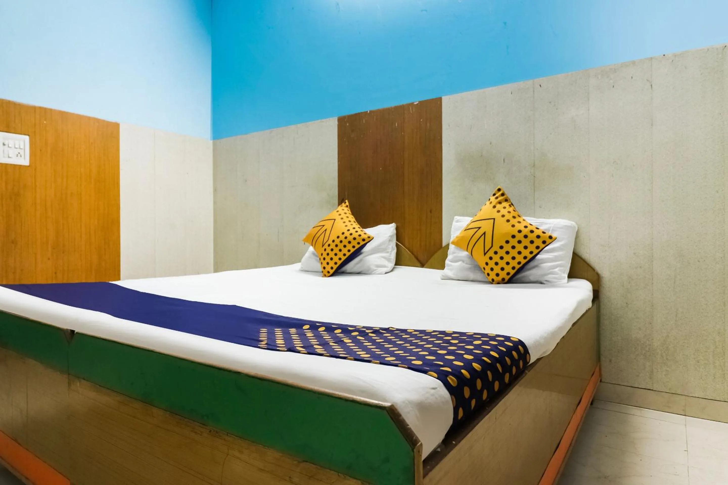 Bedroom in SPOT ON 67868 Hotel Gourav Regency