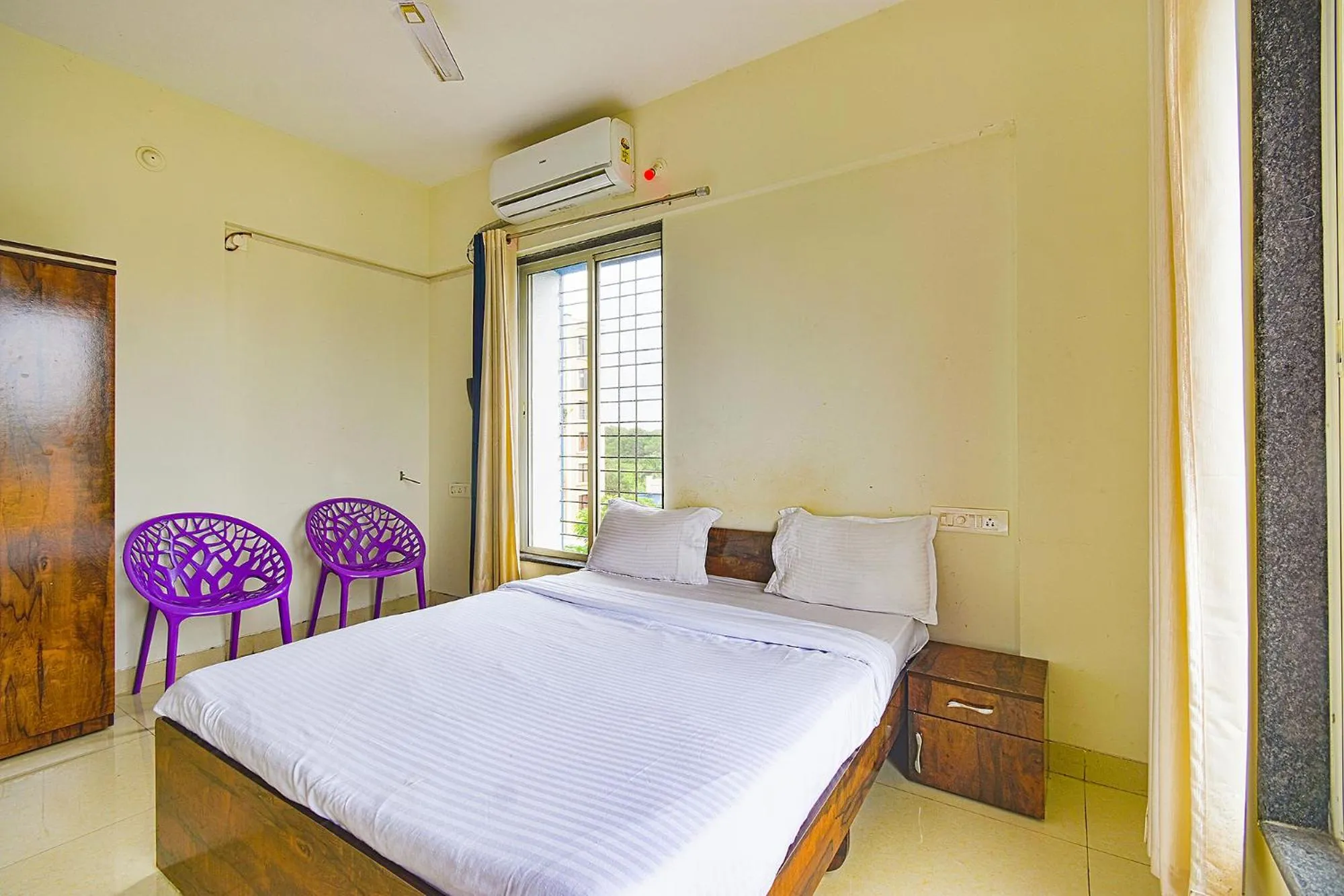 Bed in FabExpress Golden Leaf Airport