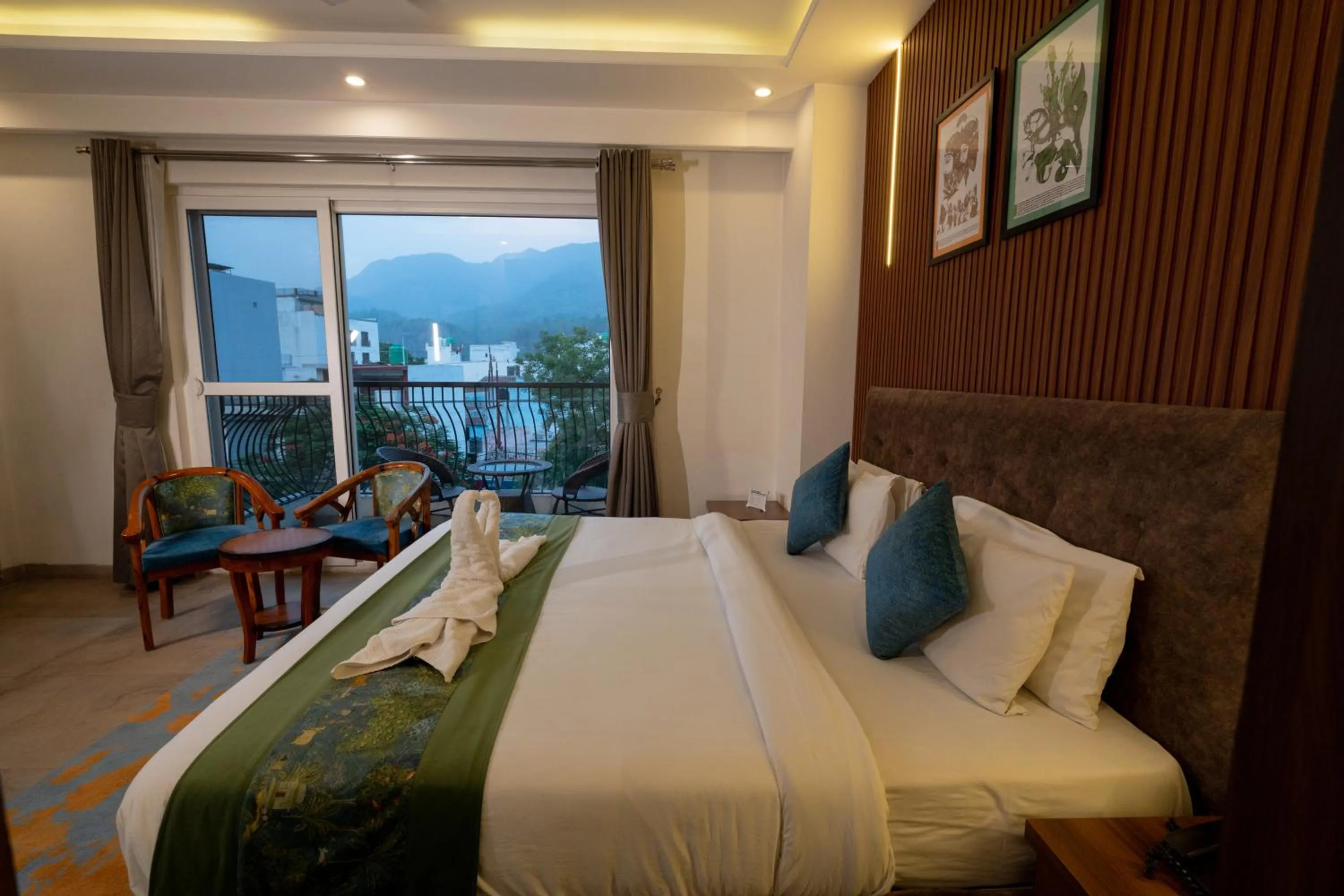 Bed in HOLYWATER Hotel by Ganga Kinare #150 mts from Ganga Ghat Rishikesh
