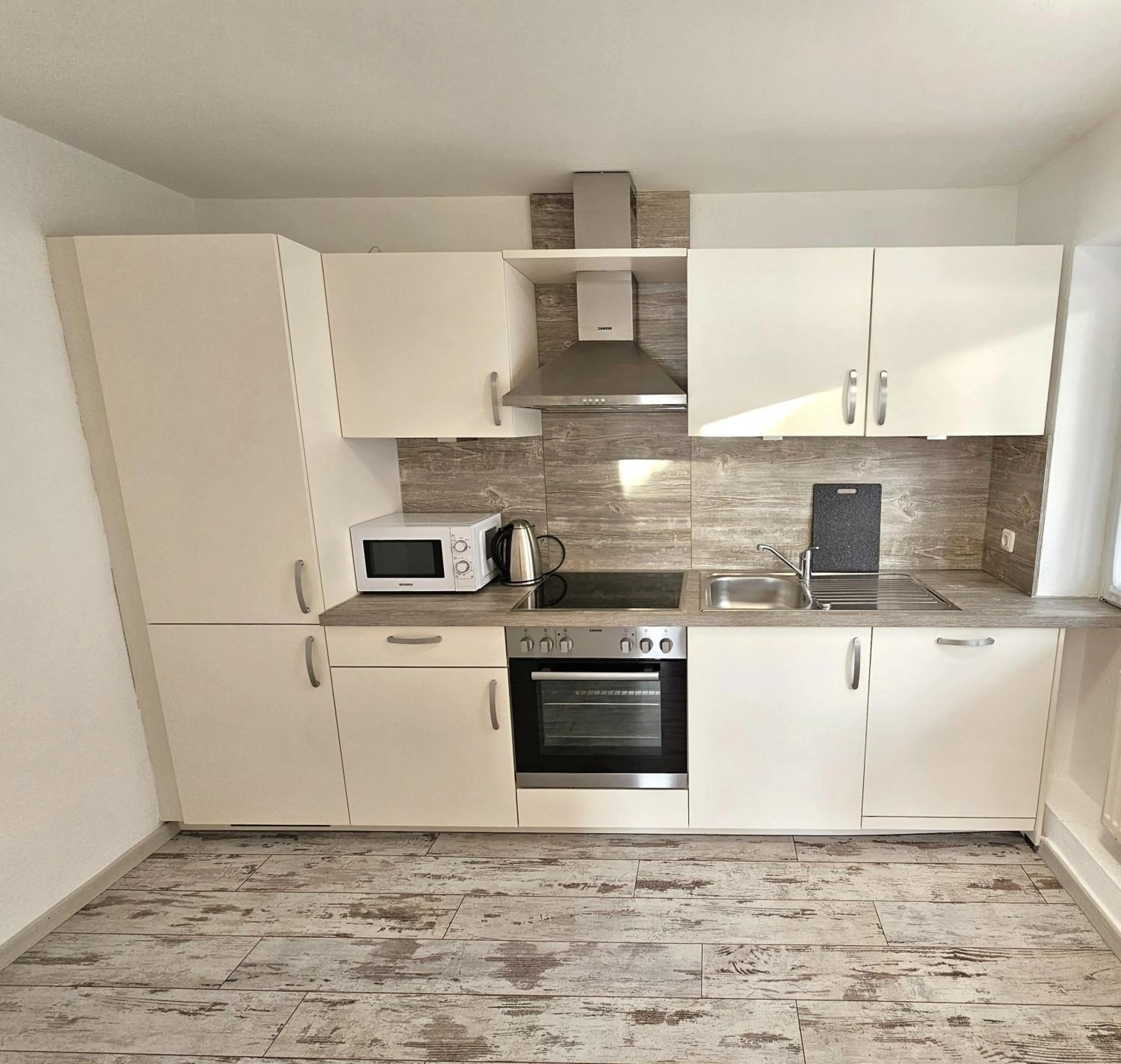 Kitchen or kitchenette in Hotel Cafe Fuggerhof