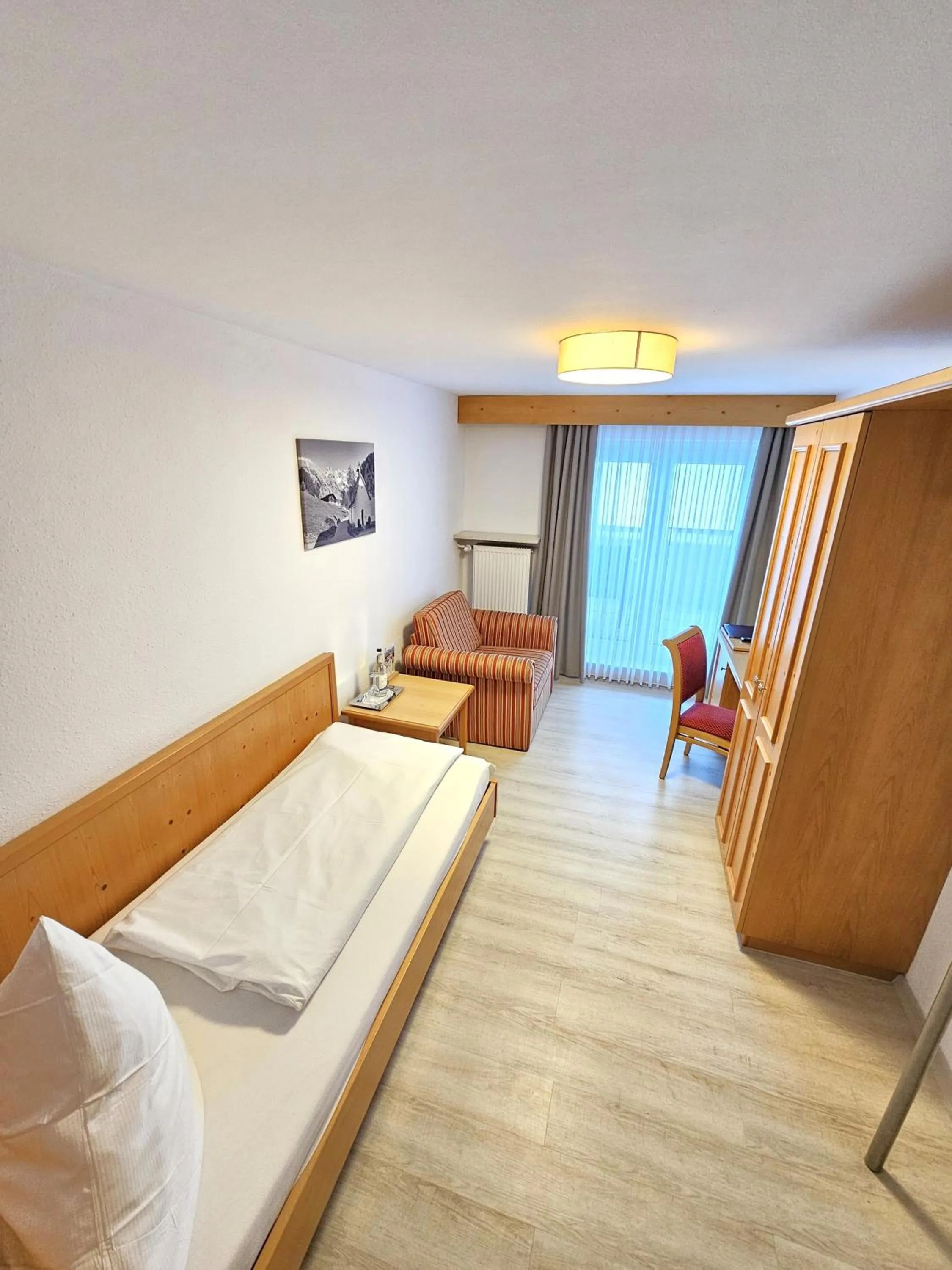 Bed in Hotel Cafe Fuggerhof