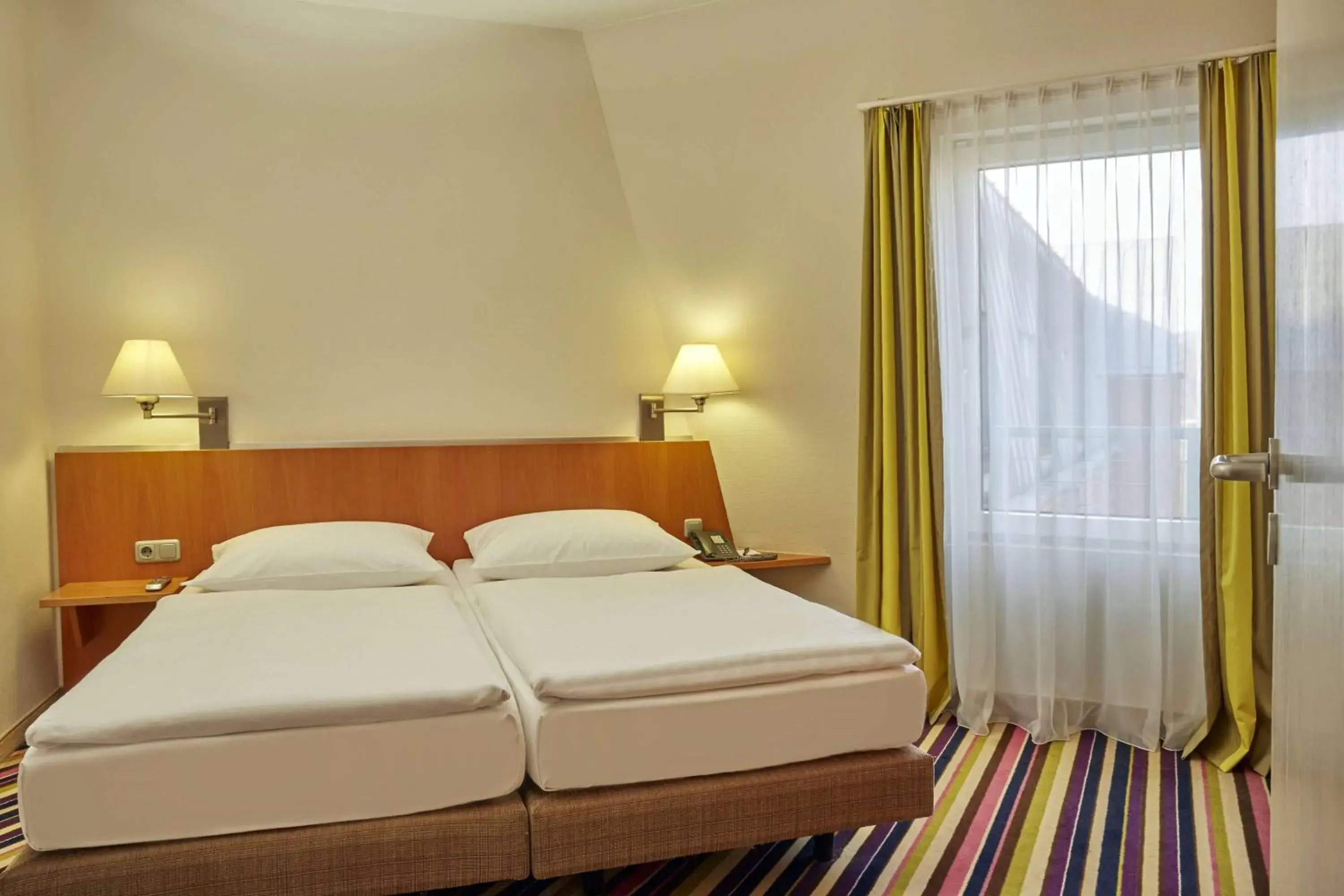 Photo of the whole room, Bed in H+ Hotel Köln Hürth Photo of the whole room, Bed in H+ Hotel Köln Hürth