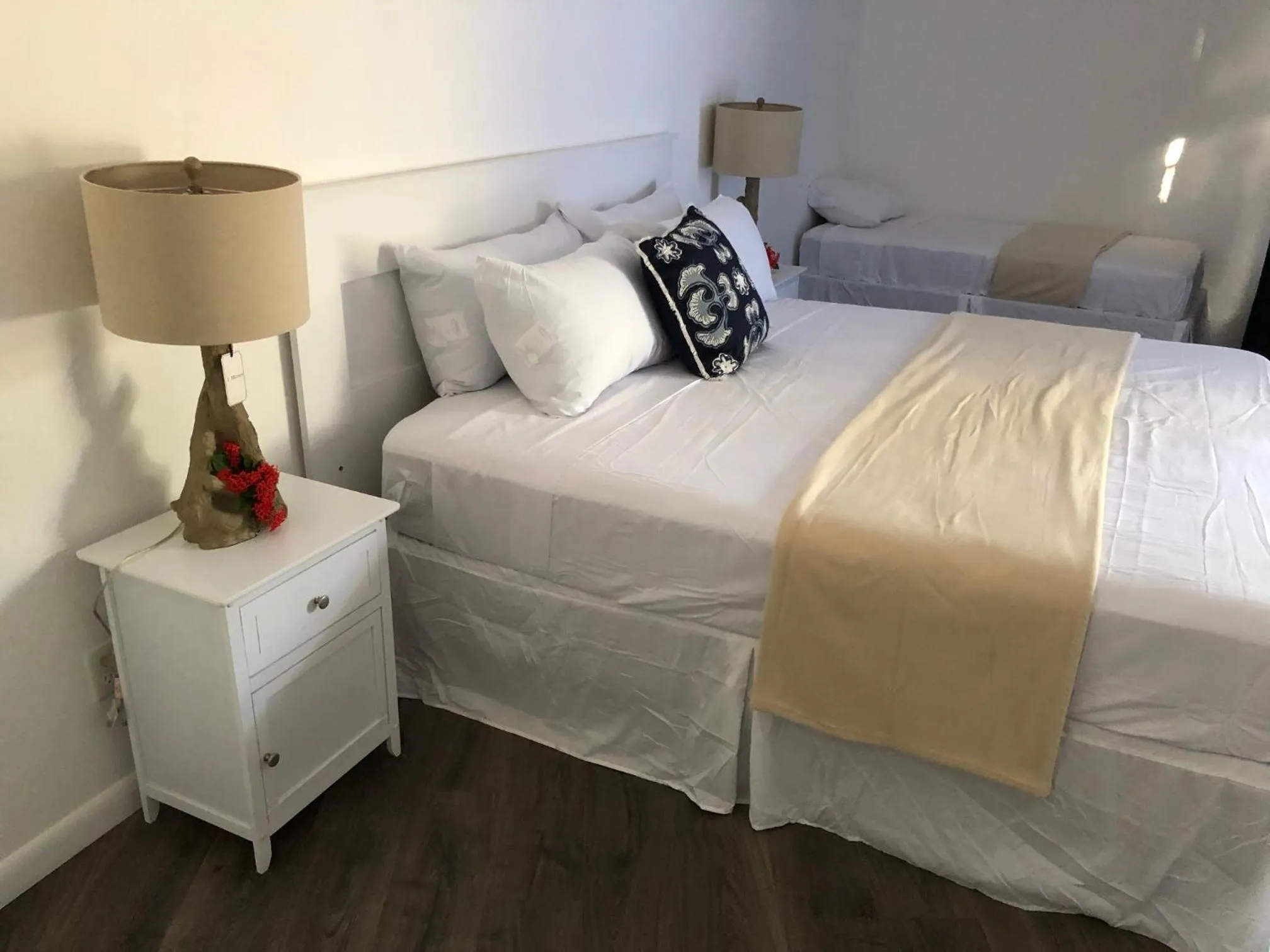 Bed in The Sunset Cove and Rainbow Room