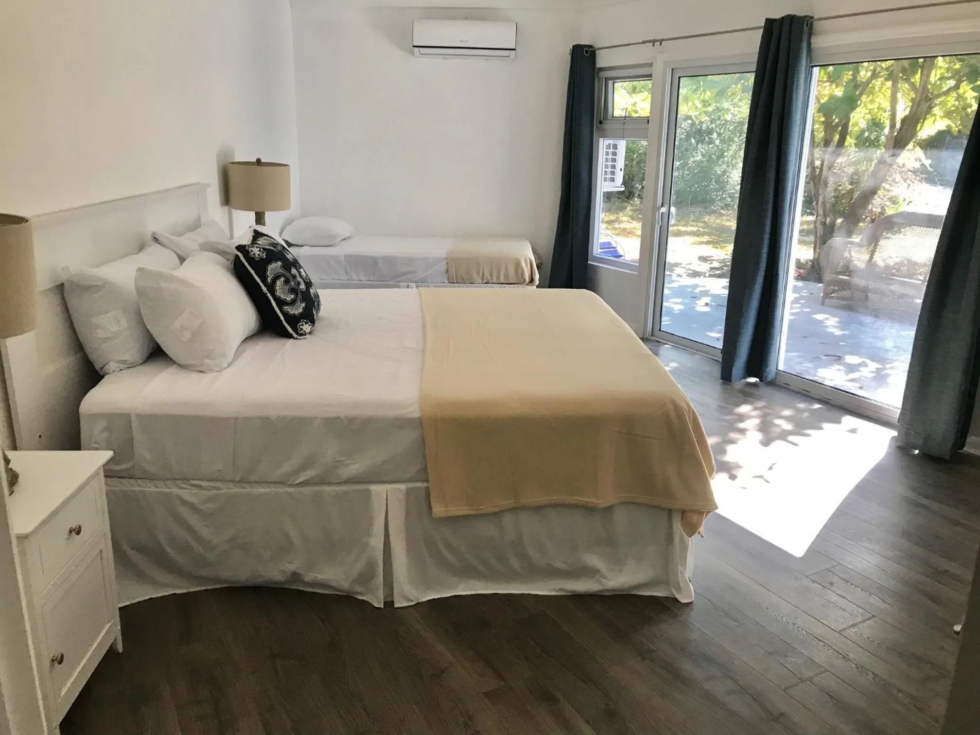 Bed in The Sunset Cove and Rainbow Room