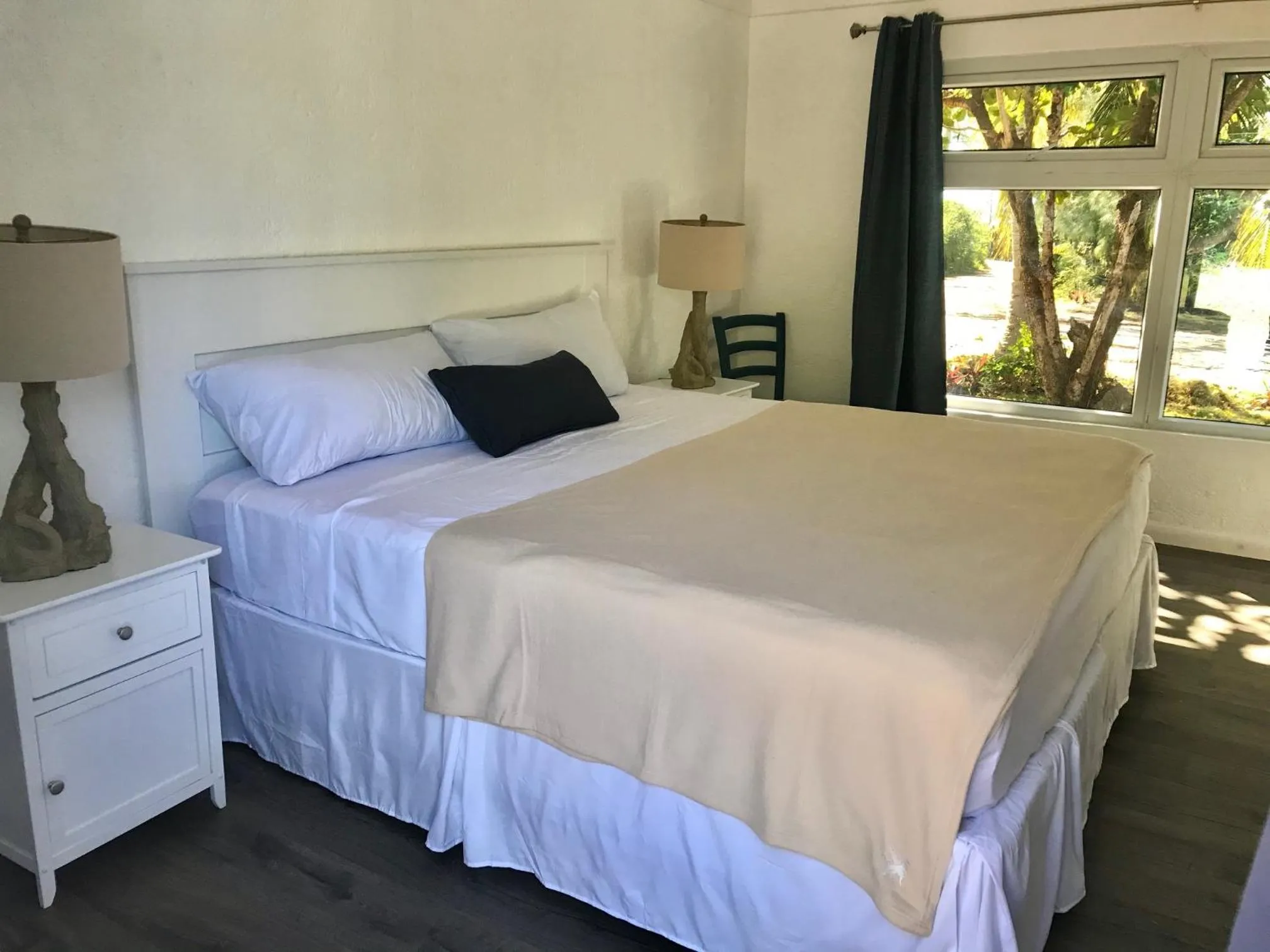 Bed in The Sunset Cove and Rainbow Room