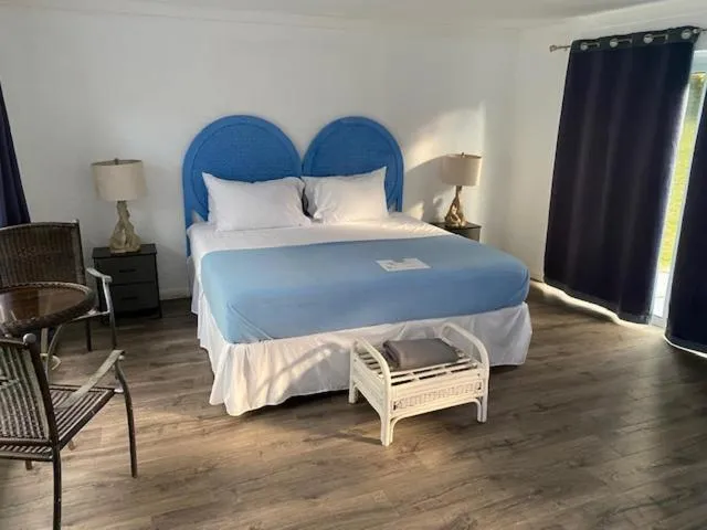 Bed in The Sunset Cove and Rainbow Room