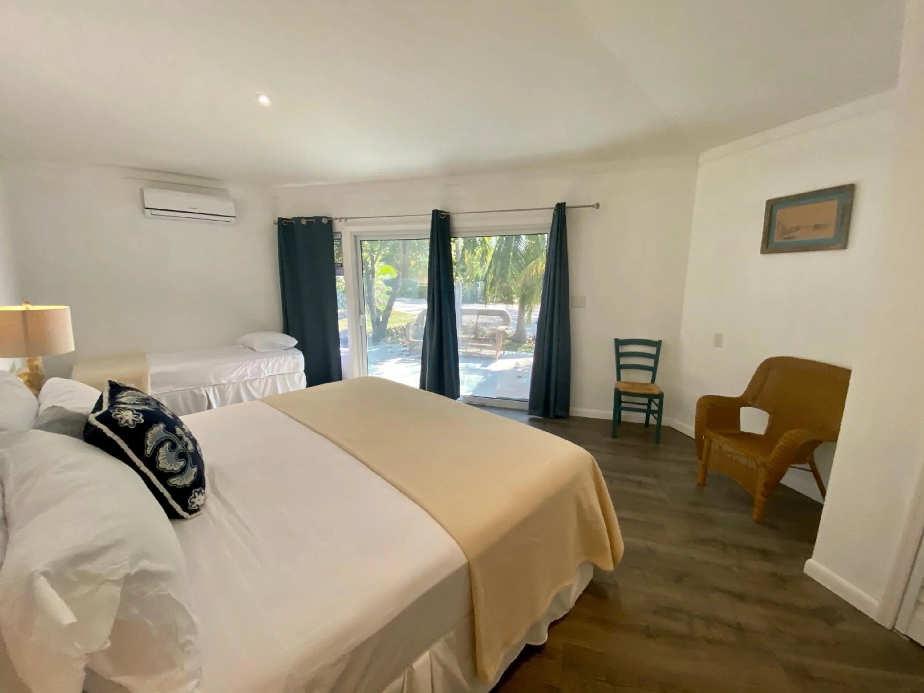 Bed in The Sunset Cove and Rainbow Room