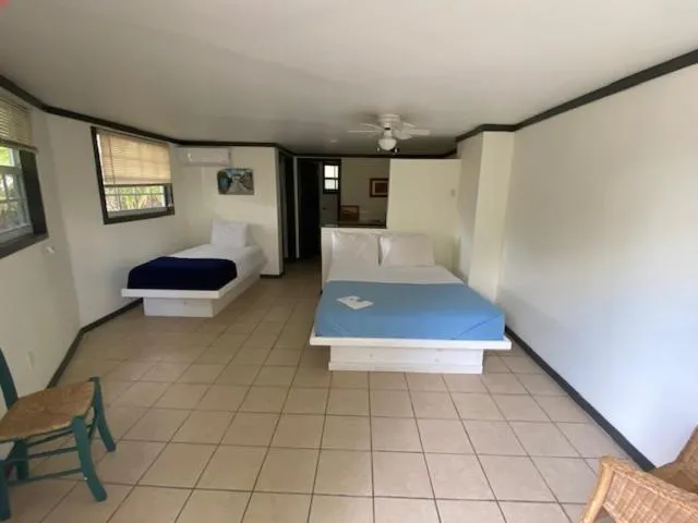 Bed in The Sunset Cove and Rainbow Room