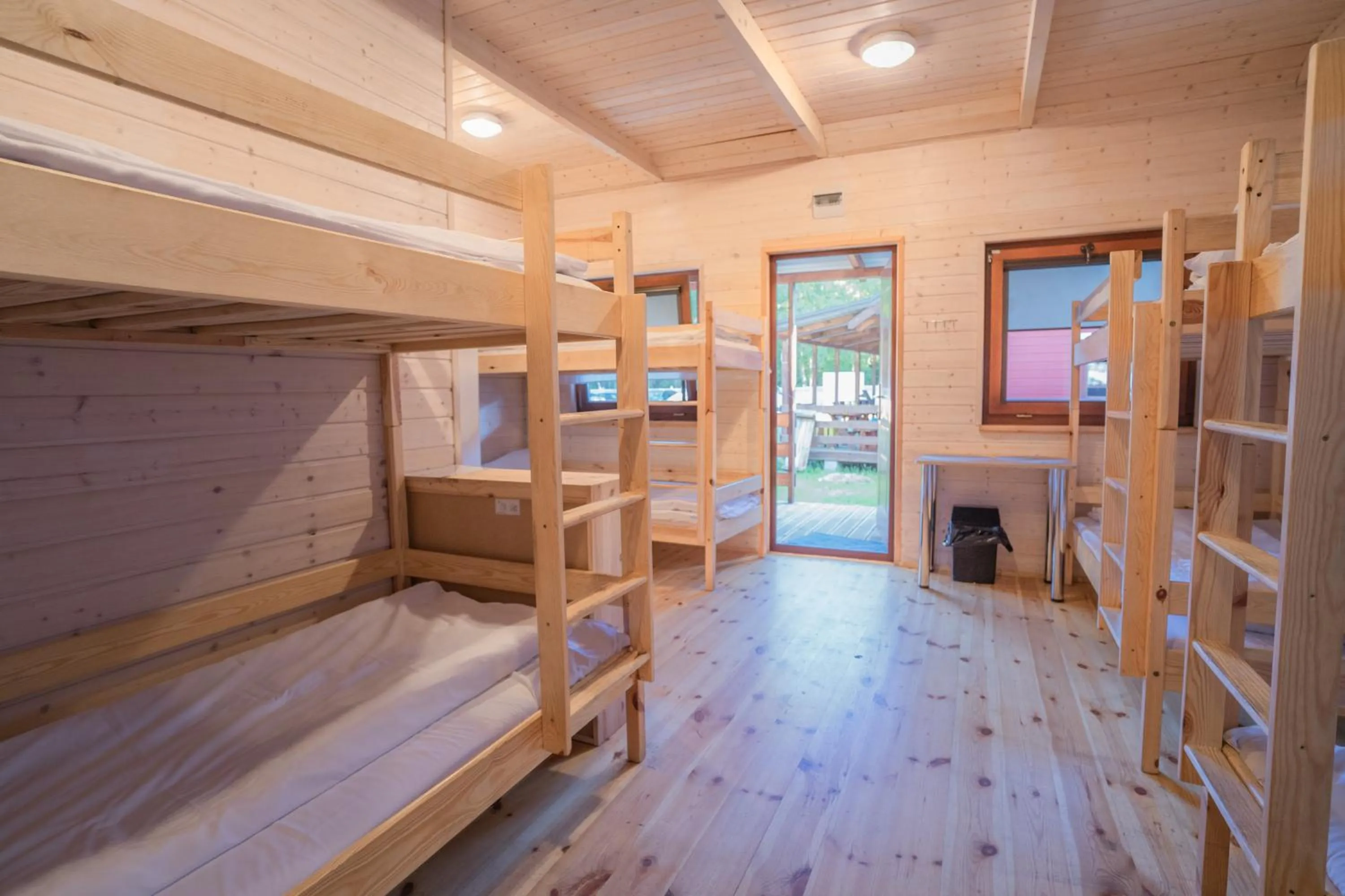 Bed in Pod Cyprysami - surf & family resort