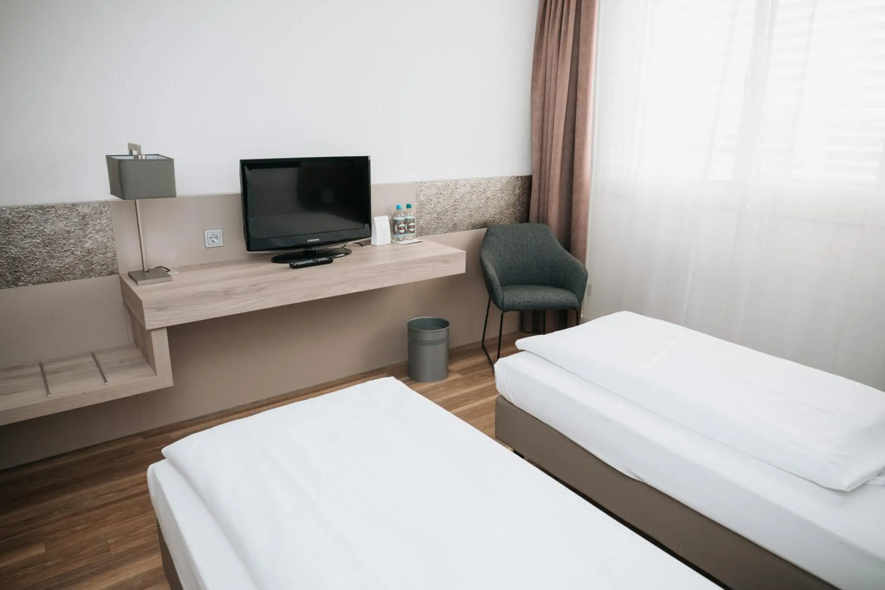 Photo of the whole room, Bed in Feringapark Hotel by Coffee Fellows Hotels Photo of the whole room, Bed in Feringapark Hotel by Coffee Fellows Hotels