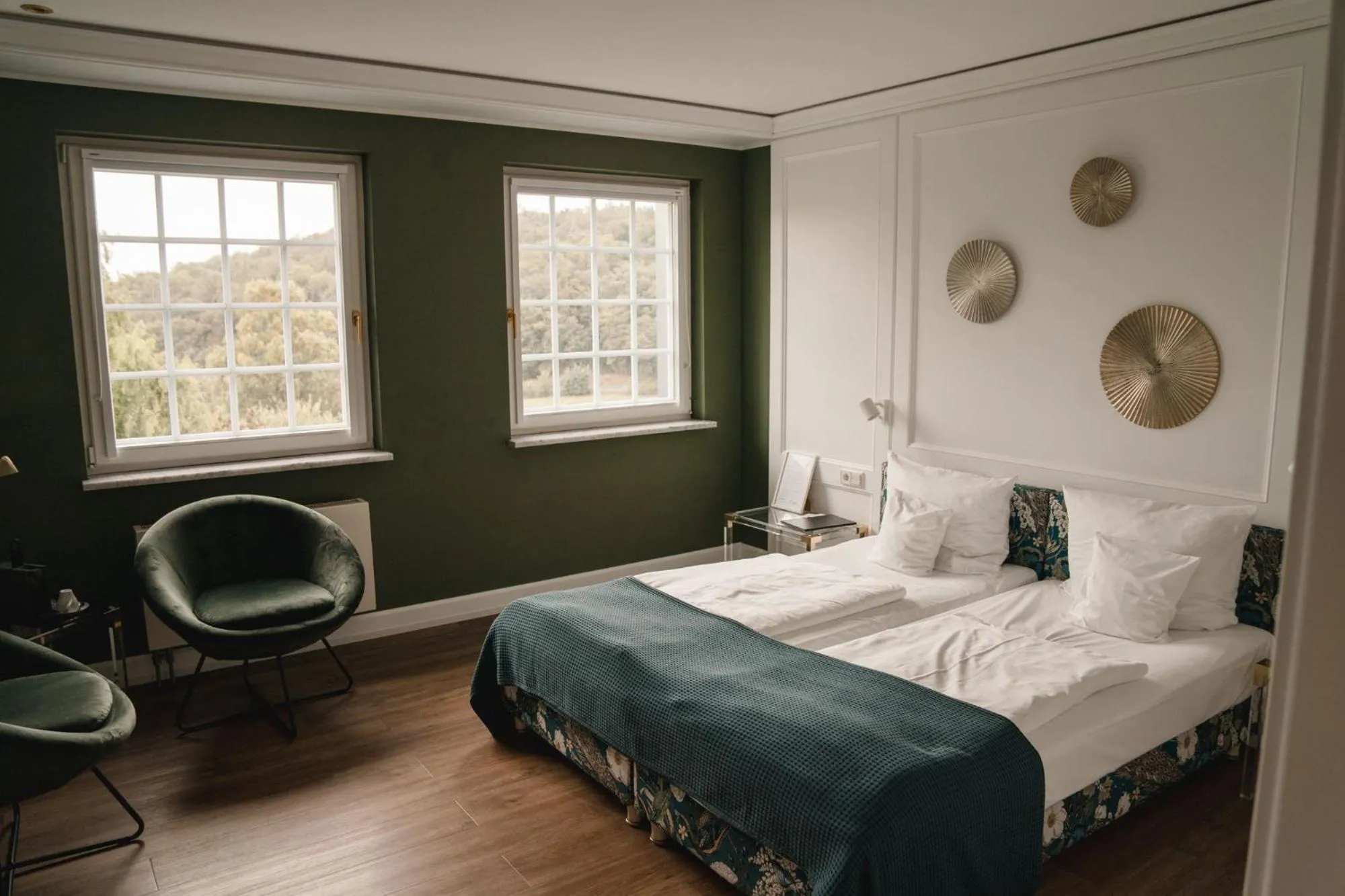 Bed in Hotel Hofgut Georgenthal