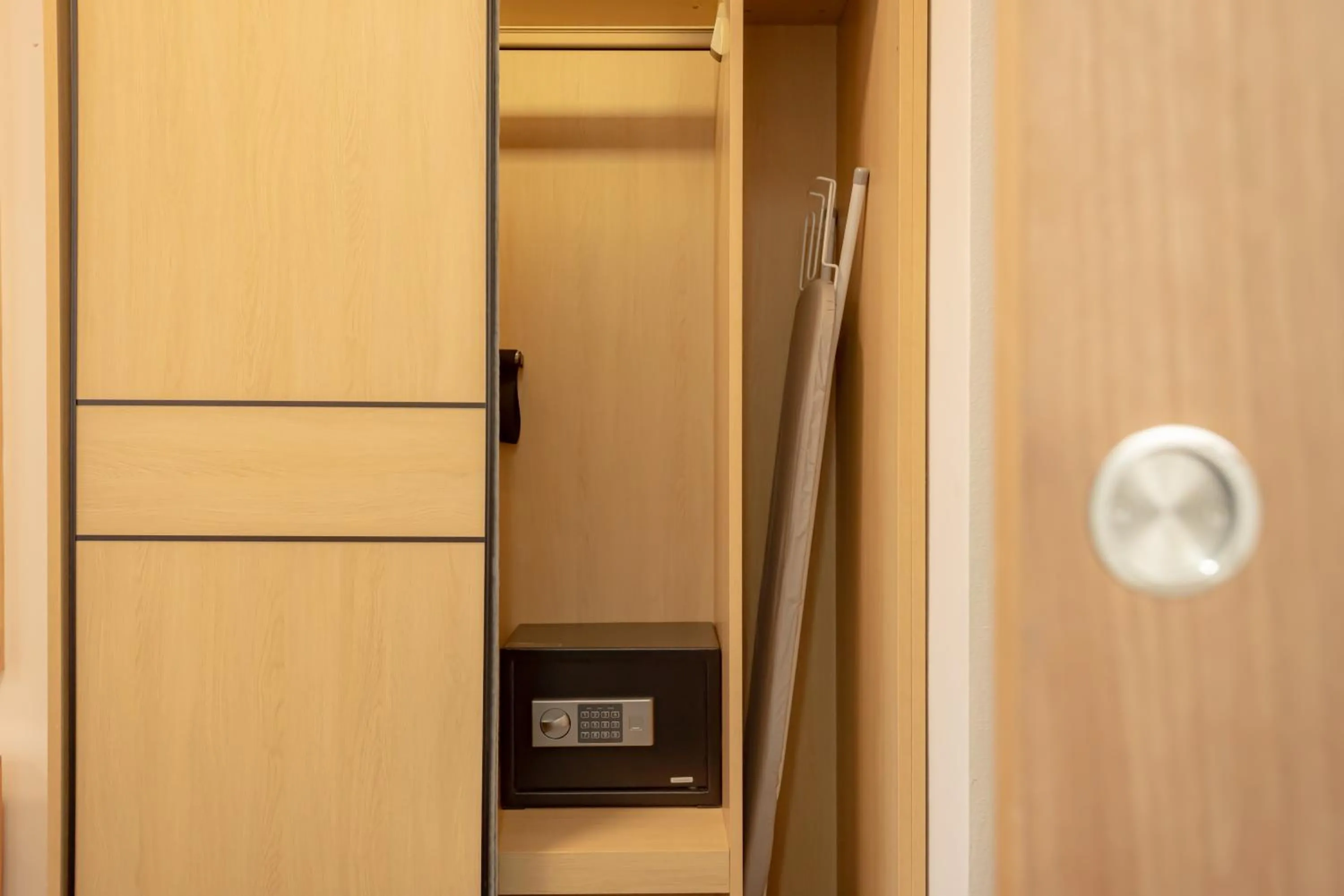 wardrobe in YEHS Hotel Sydney Harbour Suites