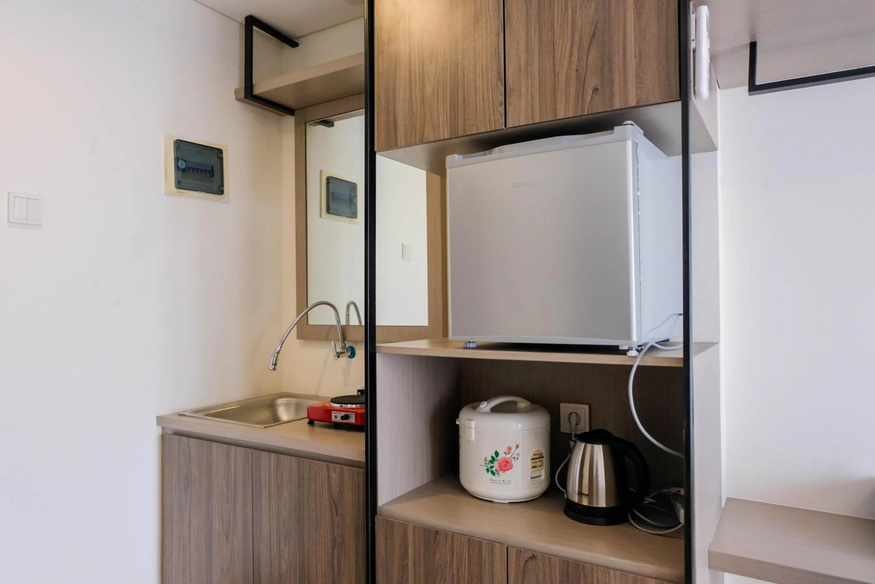 Kitchen or kitchenette in Highest Value Studio Room at Annora Living Apartment By Travelio