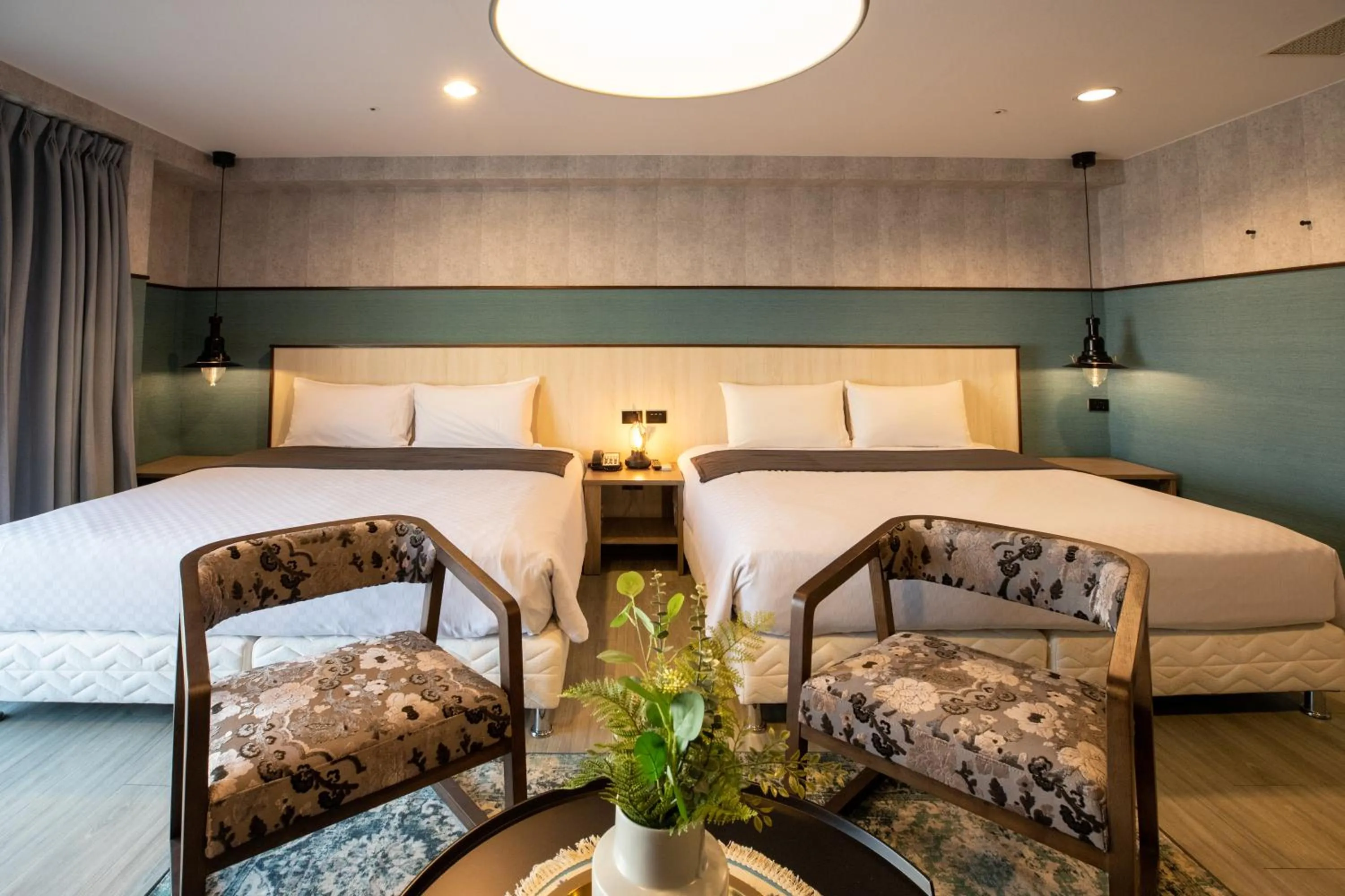 Deluxe Quadruple Room in New Generation of Boutique Business Hotel