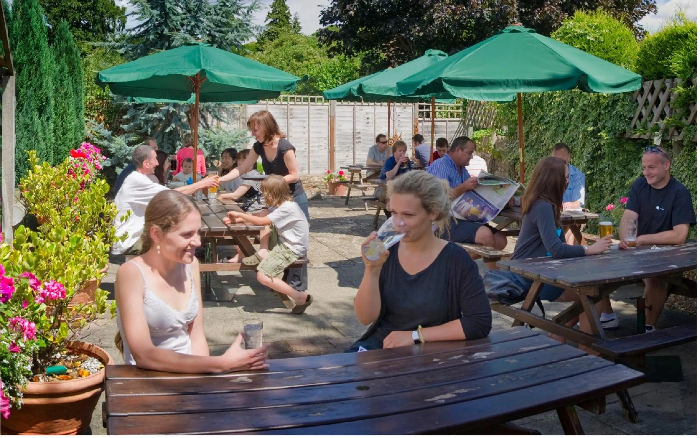 People in Eight Bells Inn