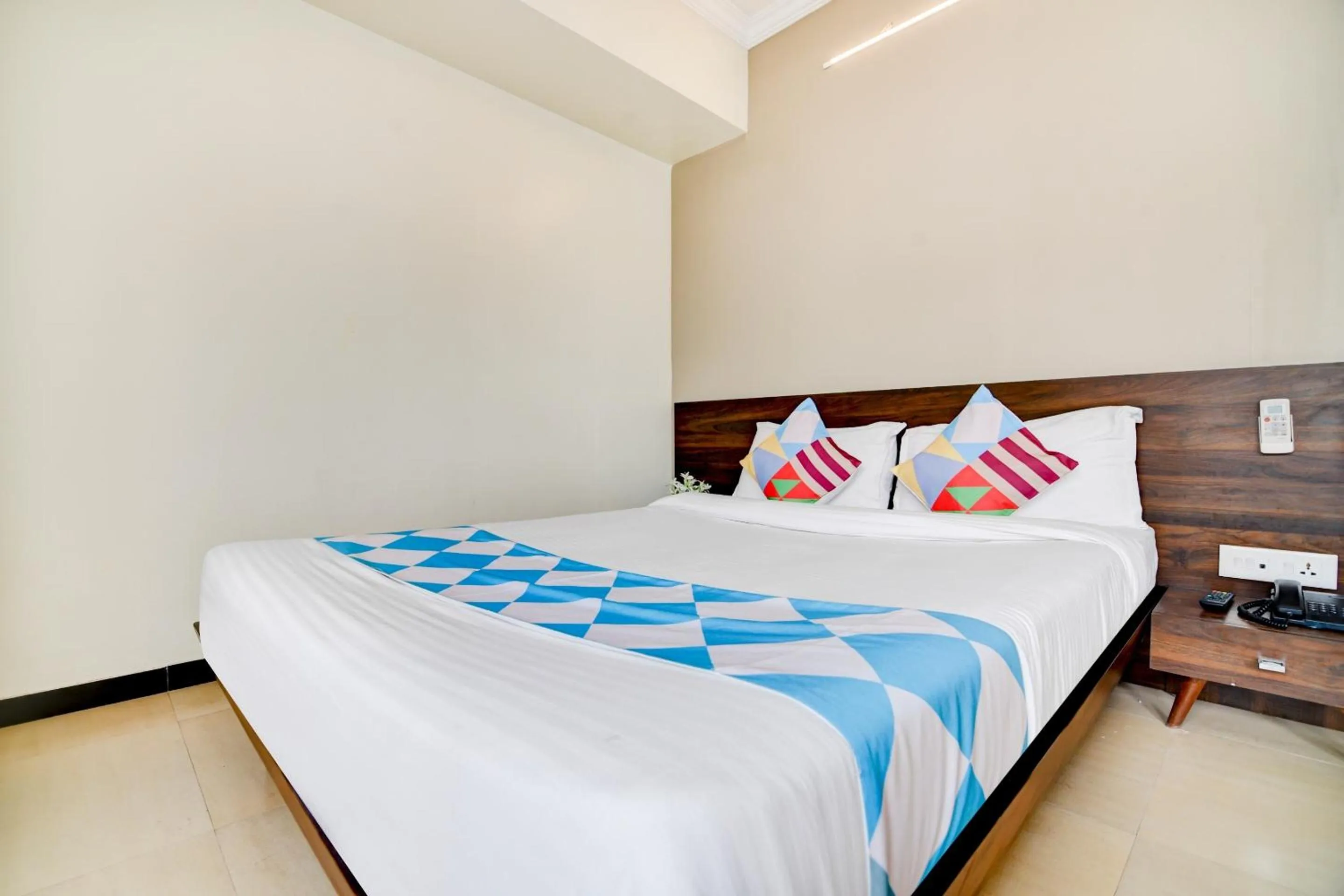 Bedroom in Hotel O Peaceful Stay Keshav Nagar.