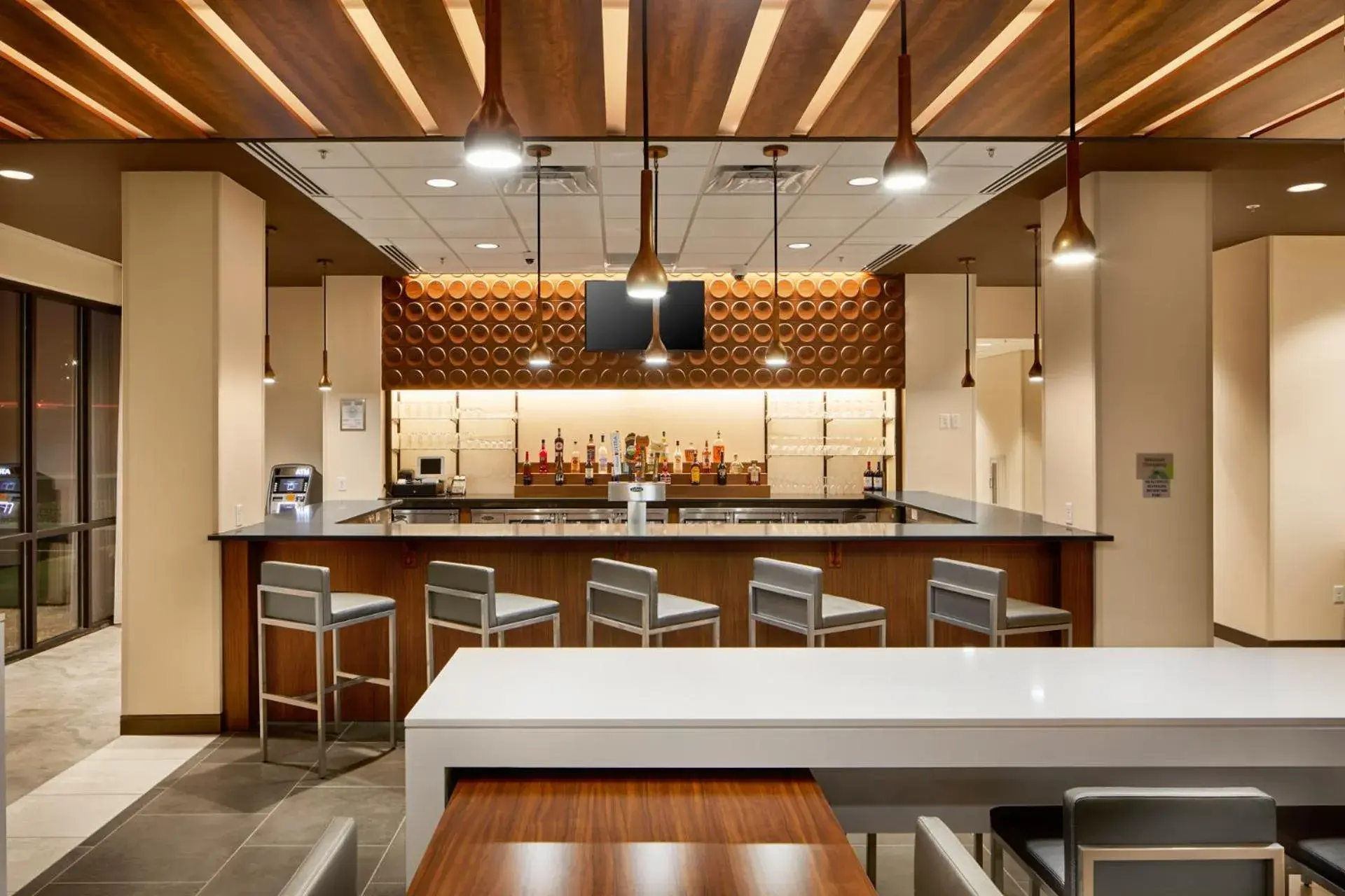 Lounge or bar in Wingate by Wyndham Hurricane WV Lounge or bar in Wingate by Wyndham Hurricane WV