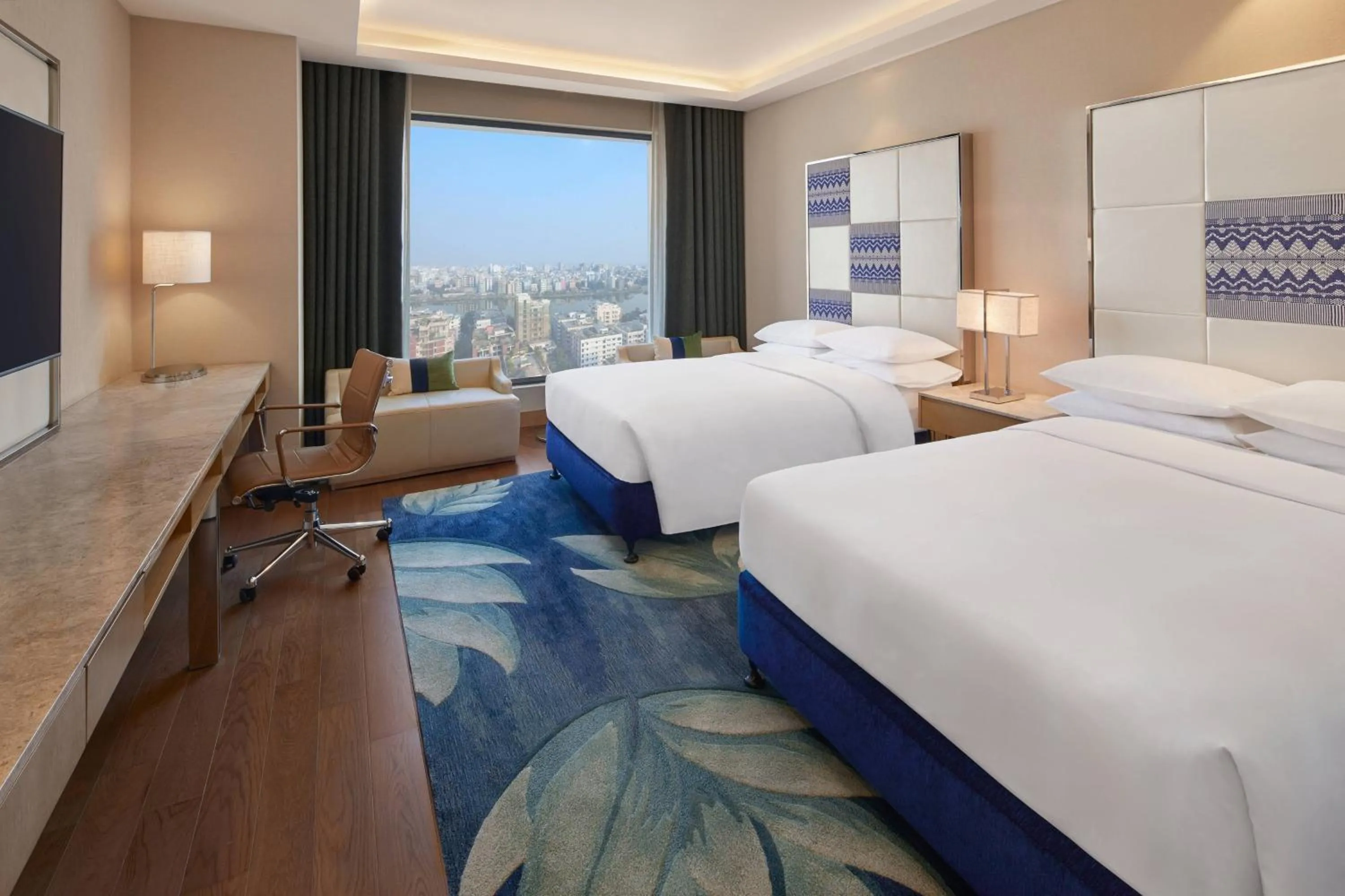 Photo of the whole room, Bed in Renaissance Dhaka Gulshan Hotel