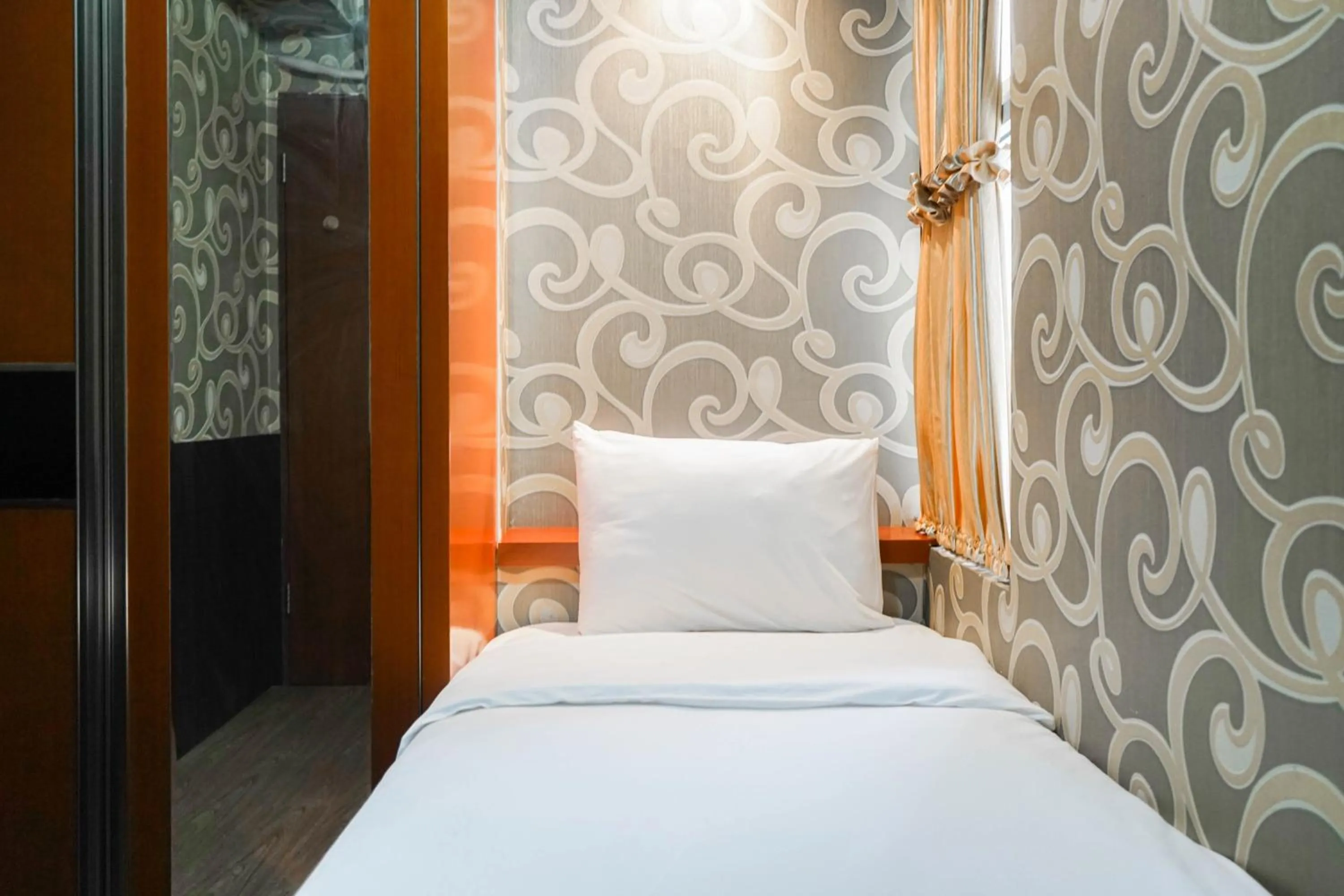 Bed in Best Price 2BR at Tifolia Apartment By Travelio