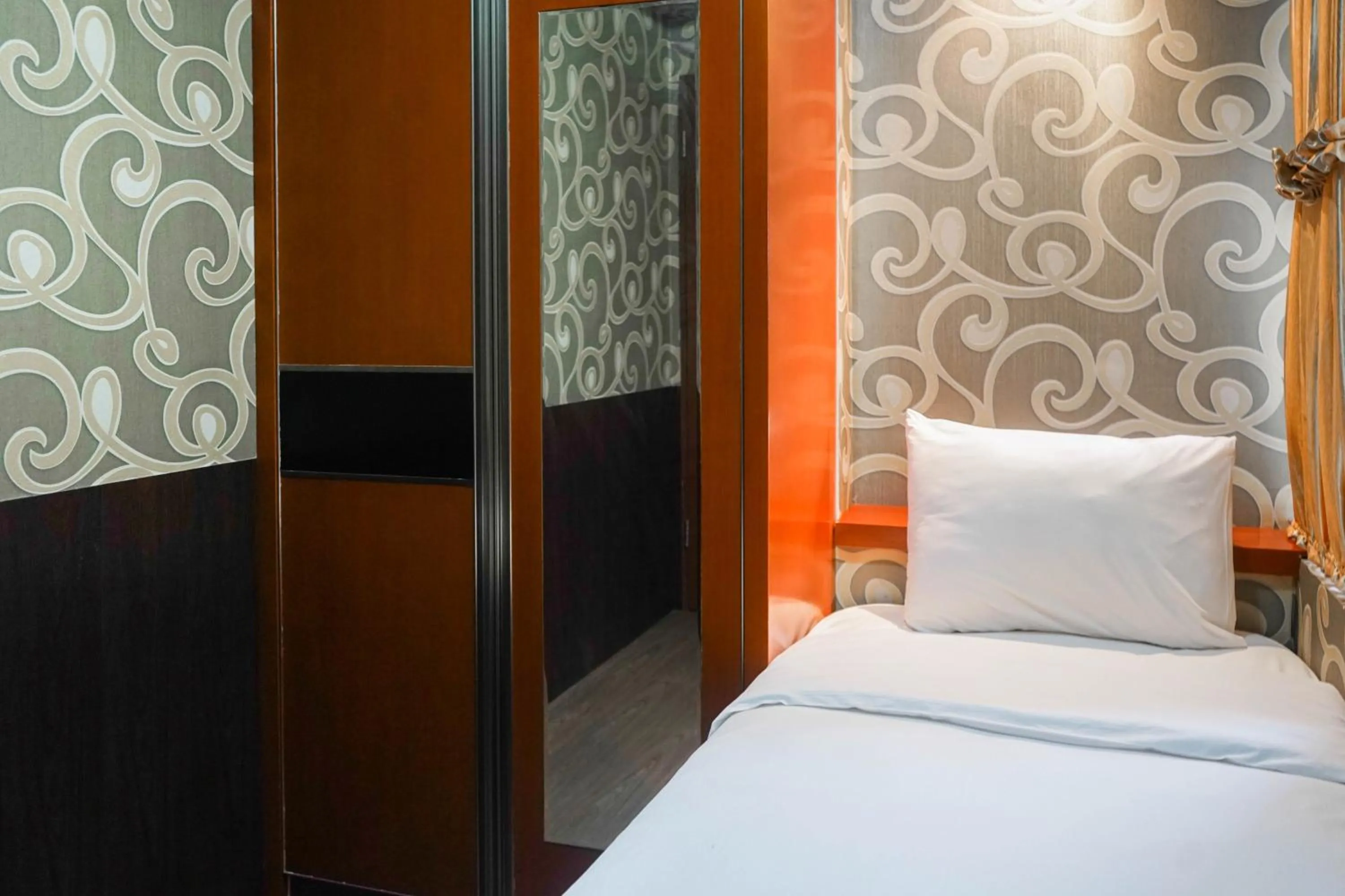 Bed in Best Price 2BR at Tifolia Apartment By Travelio