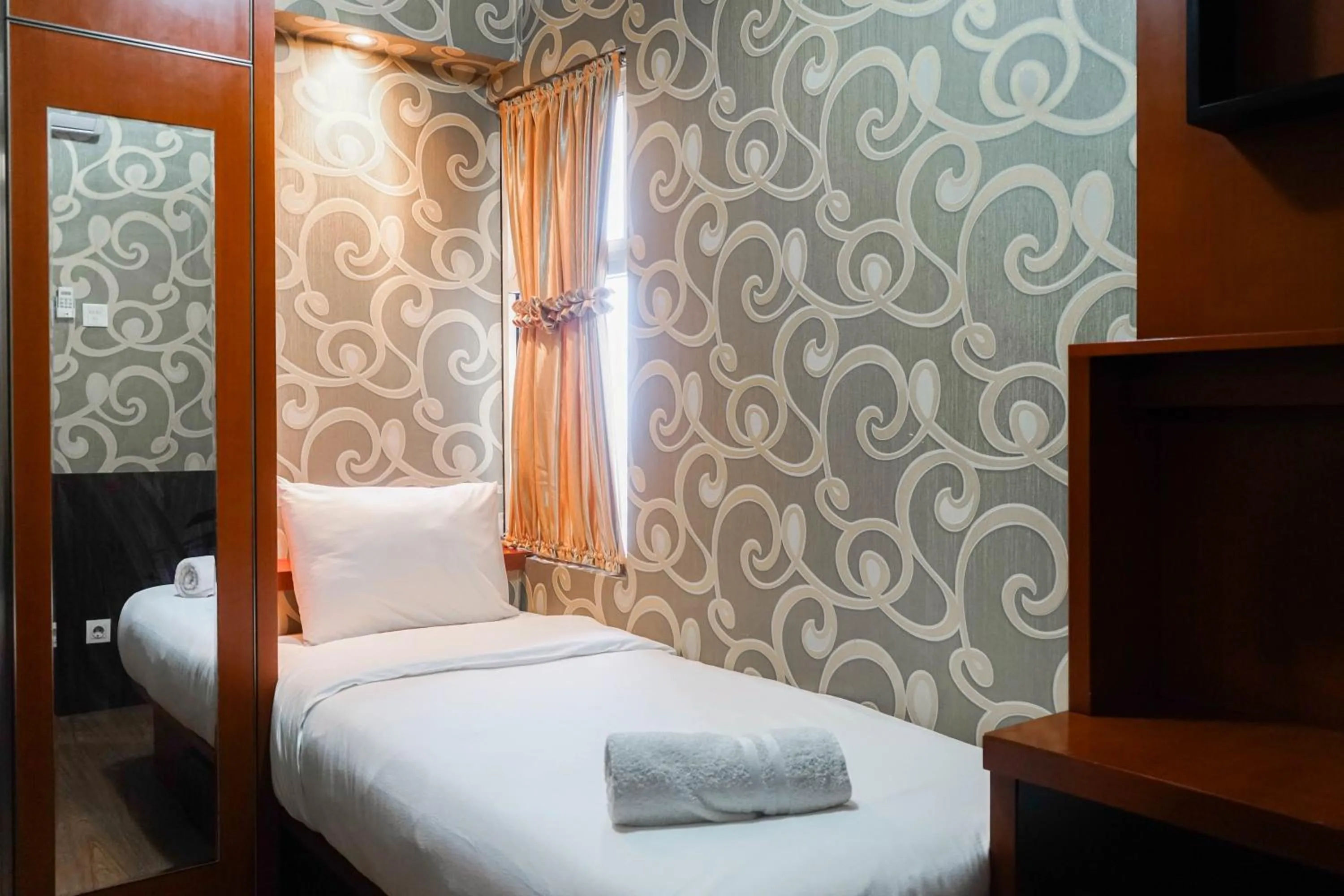 Bed in Best Price 2BR at Tifolia Apartment By Travelio