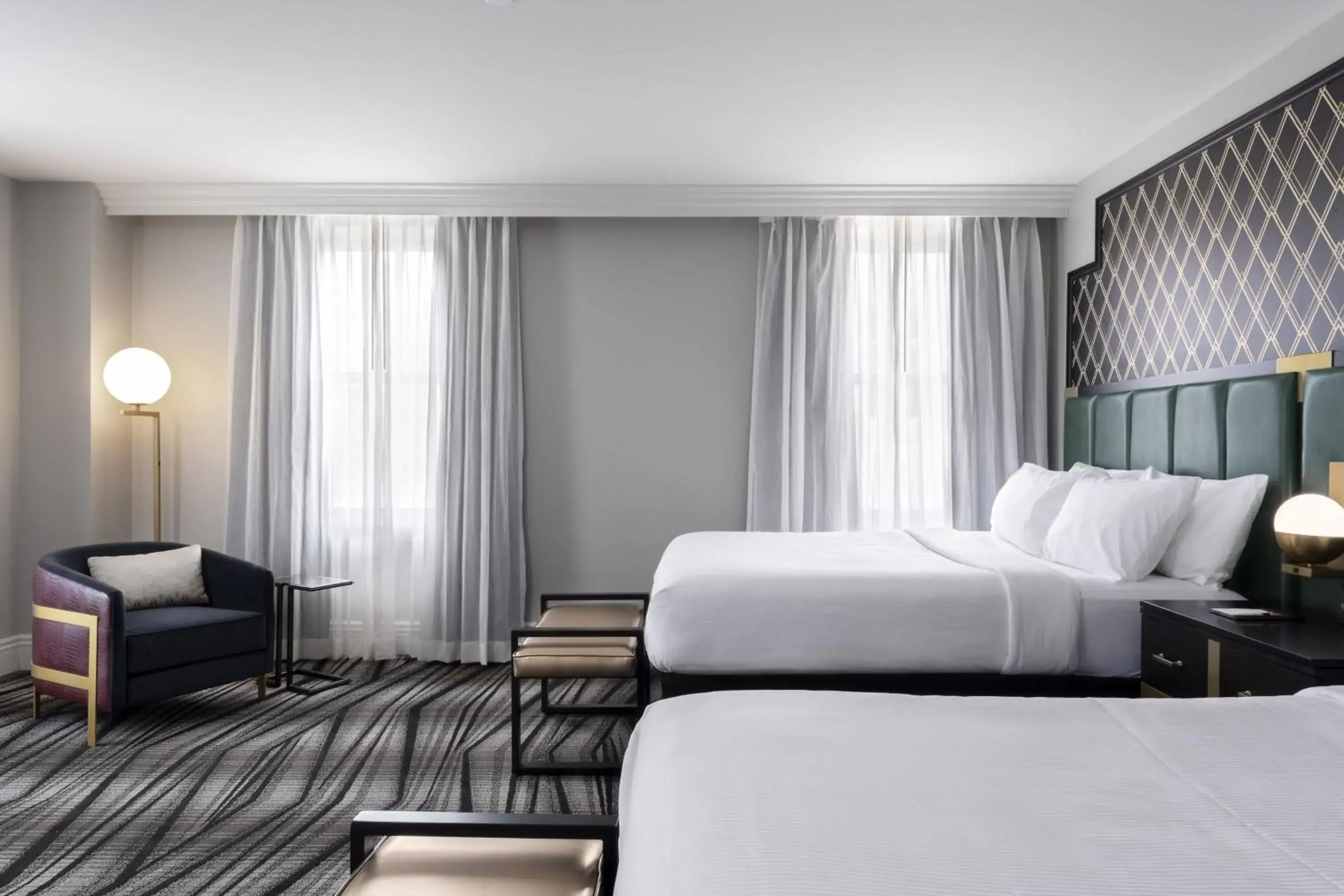 Queen Room with Two Queen Beds and Roll-in Shower - Mobility and Hearing Accessible in The Warrior Hotel, Autograph Collection Queen Room with Two Queen Beds and Roll-in Shower - Mobility and Hearing Accessible in The Warrior Hotel, Autograph Collection