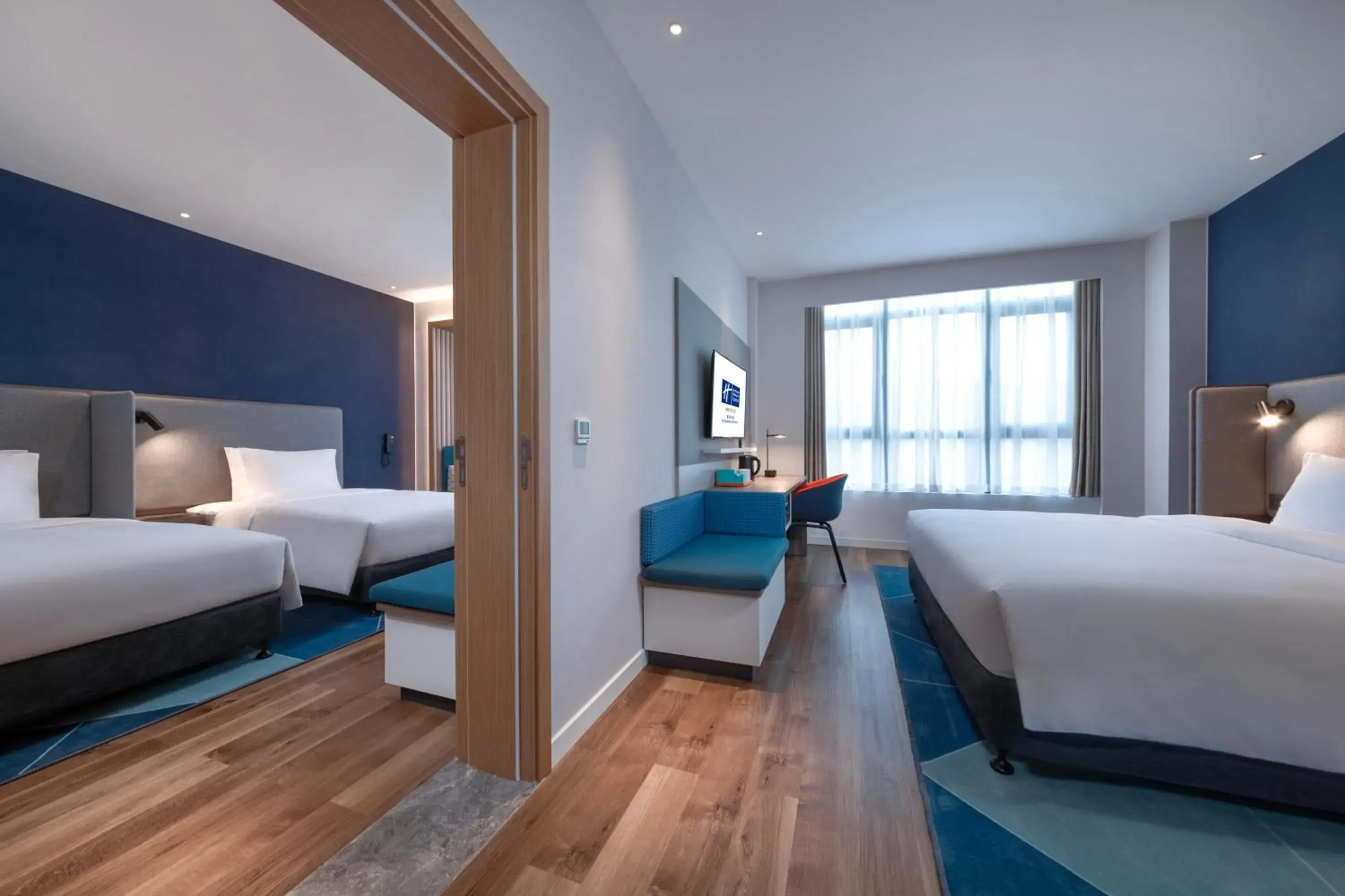 Bed in Holiday Inn Express Chongqing Zhongxian by IHG Bed in Holiday Inn Express Chongqing Zhongxian by IHG