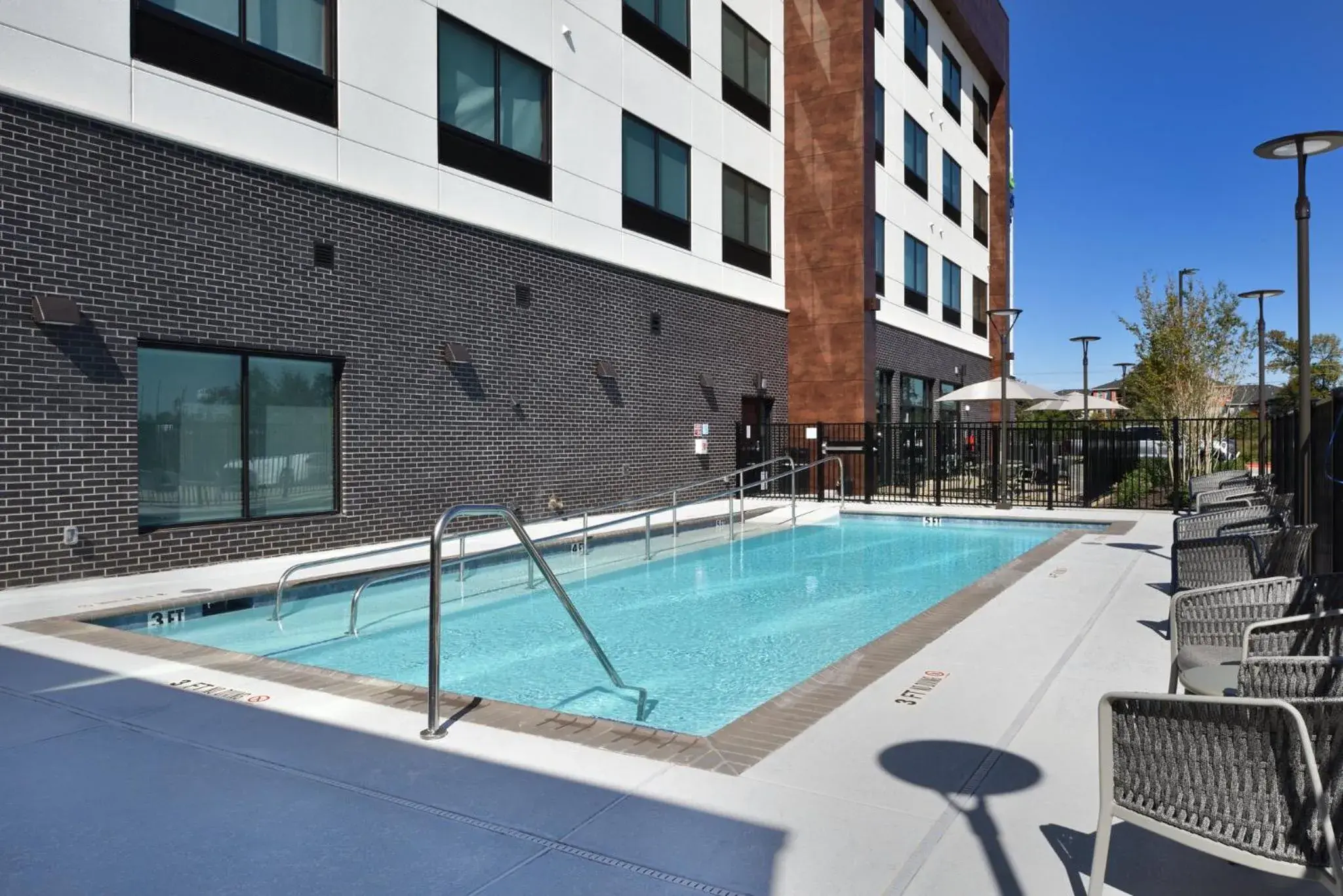 Swimming pool in Holiday Inn Express & Suites Spring - Woodlands Area by IHG Swimming pool in Holiday Inn Express & Suites Spring - Woodlands Area by IHG