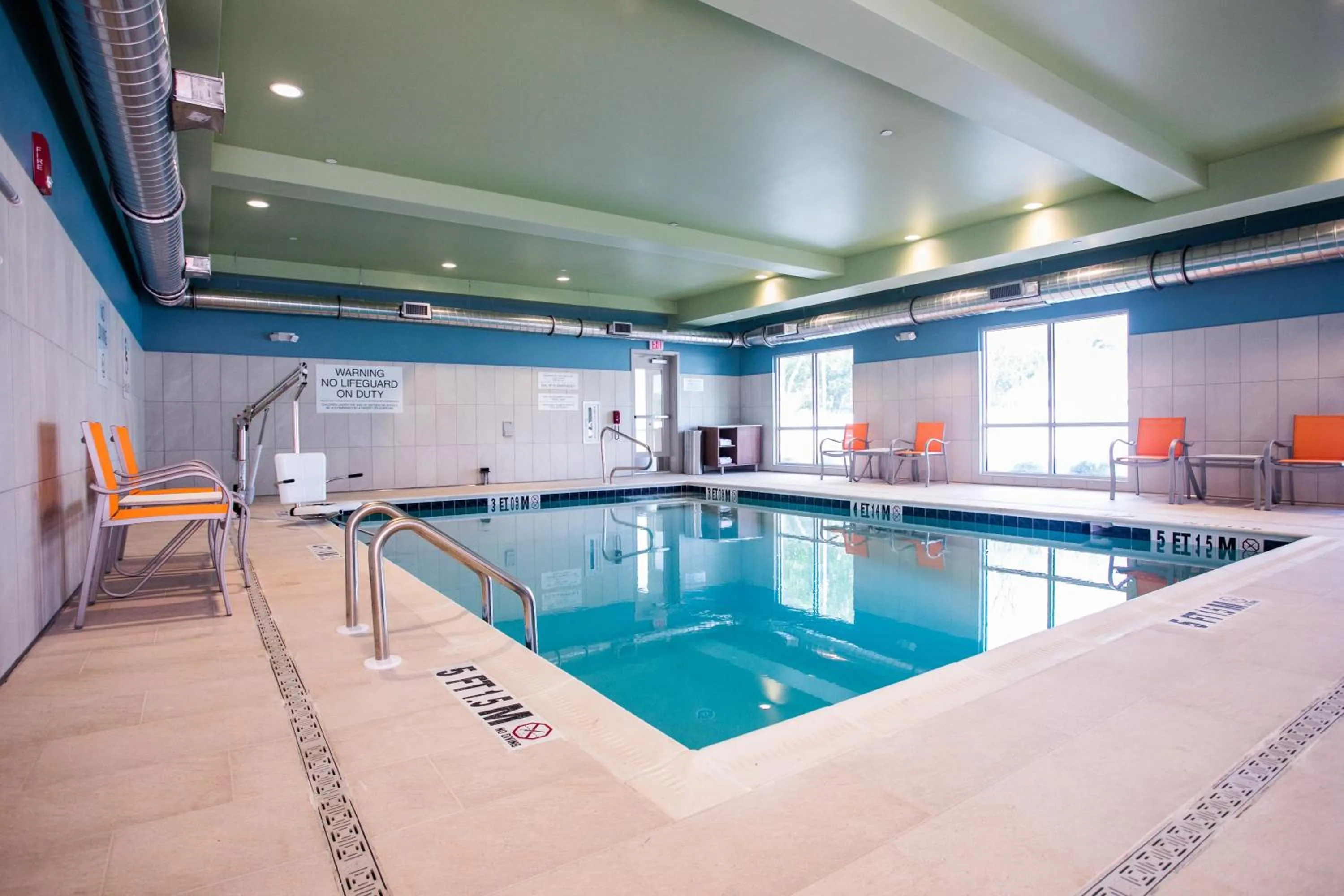 Swimming pool in Holiday Inn Express & Suites Rehoboth Beach by IHG