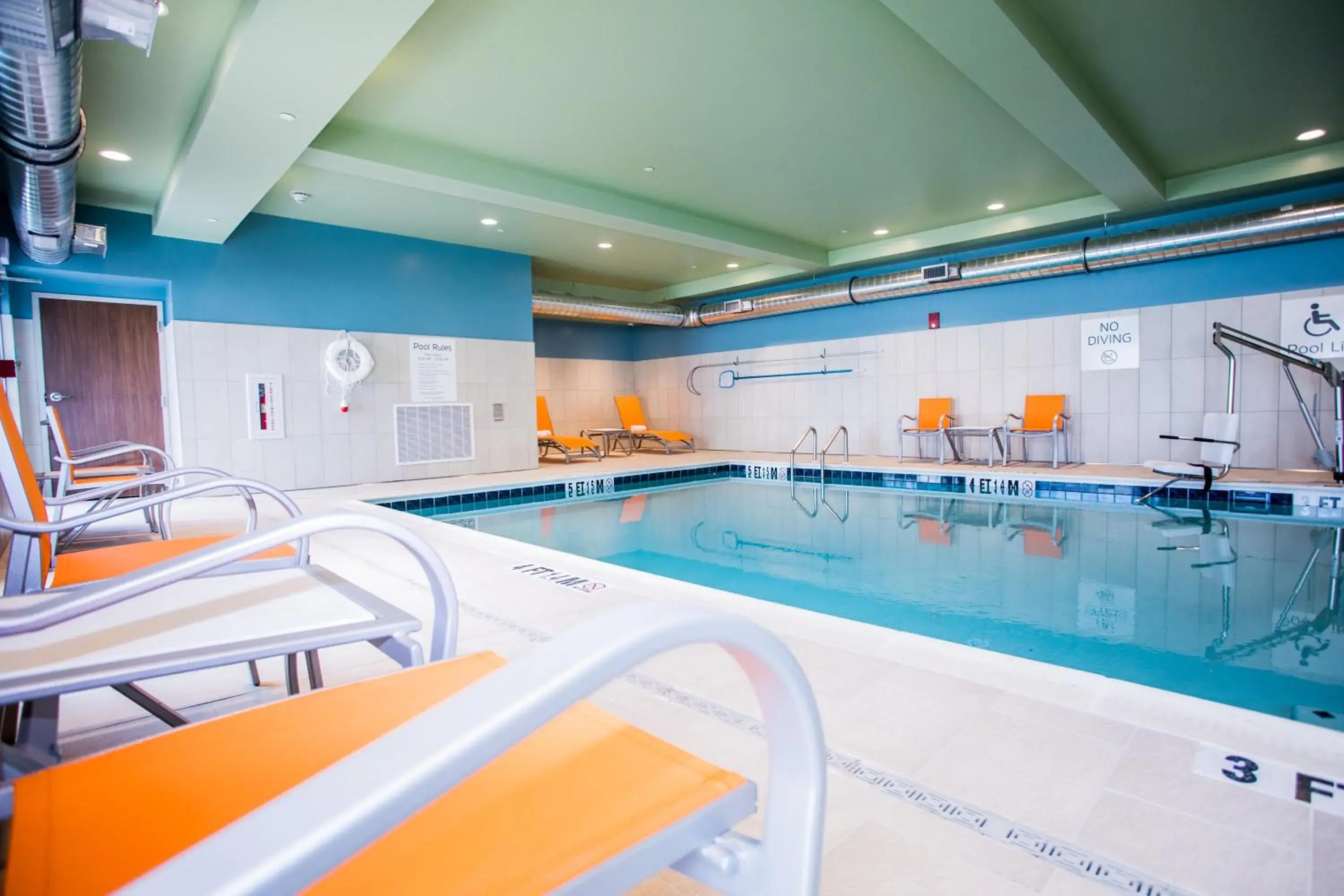 Swimming pool in Holiday Inn Express & Suites Rehoboth Beach by IHG Swimming pool in Holiday Inn Express & Suites Rehoboth Beach by IHG