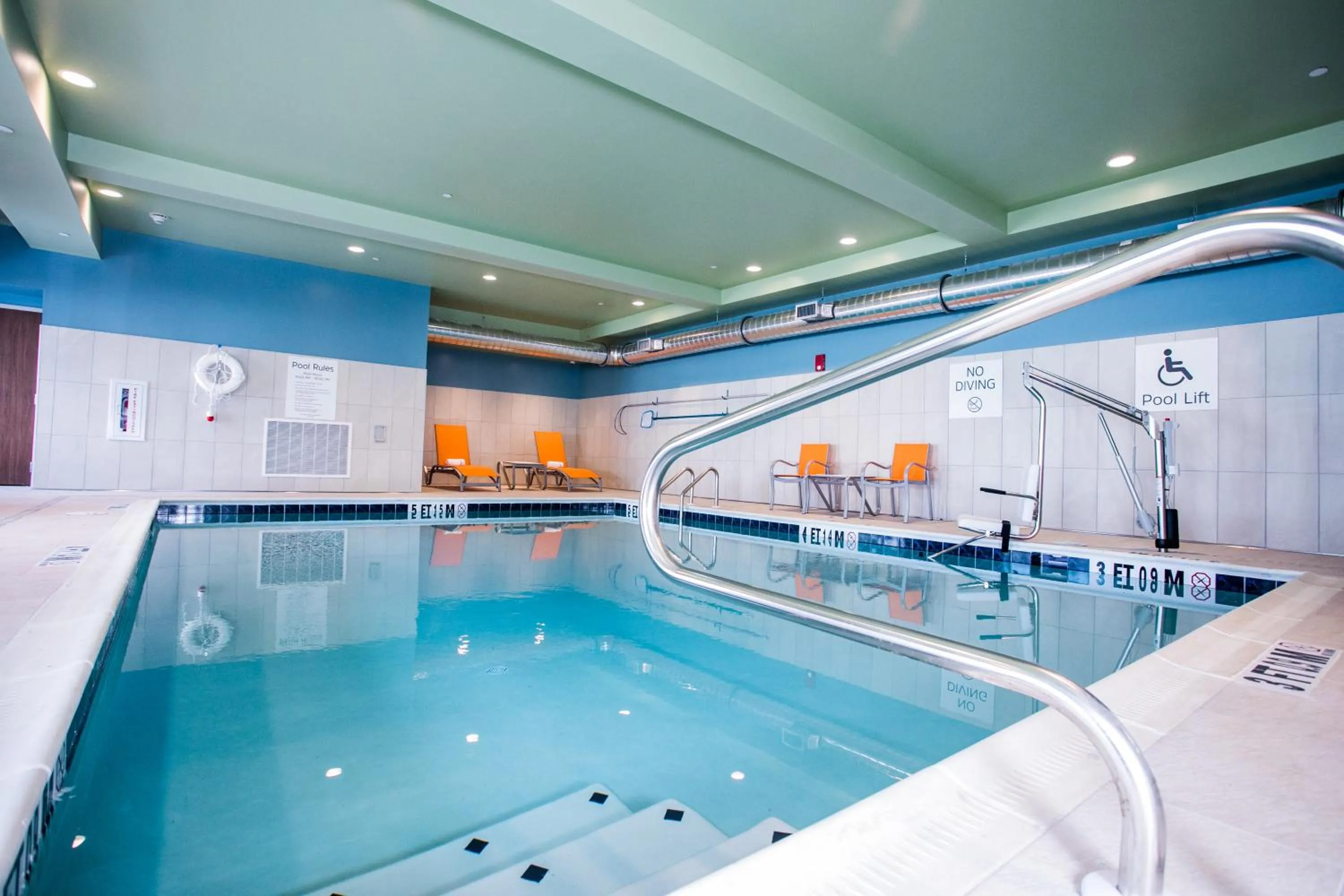 Swimming pool in Holiday Inn Express & Suites Rehoboth Beach by IHG